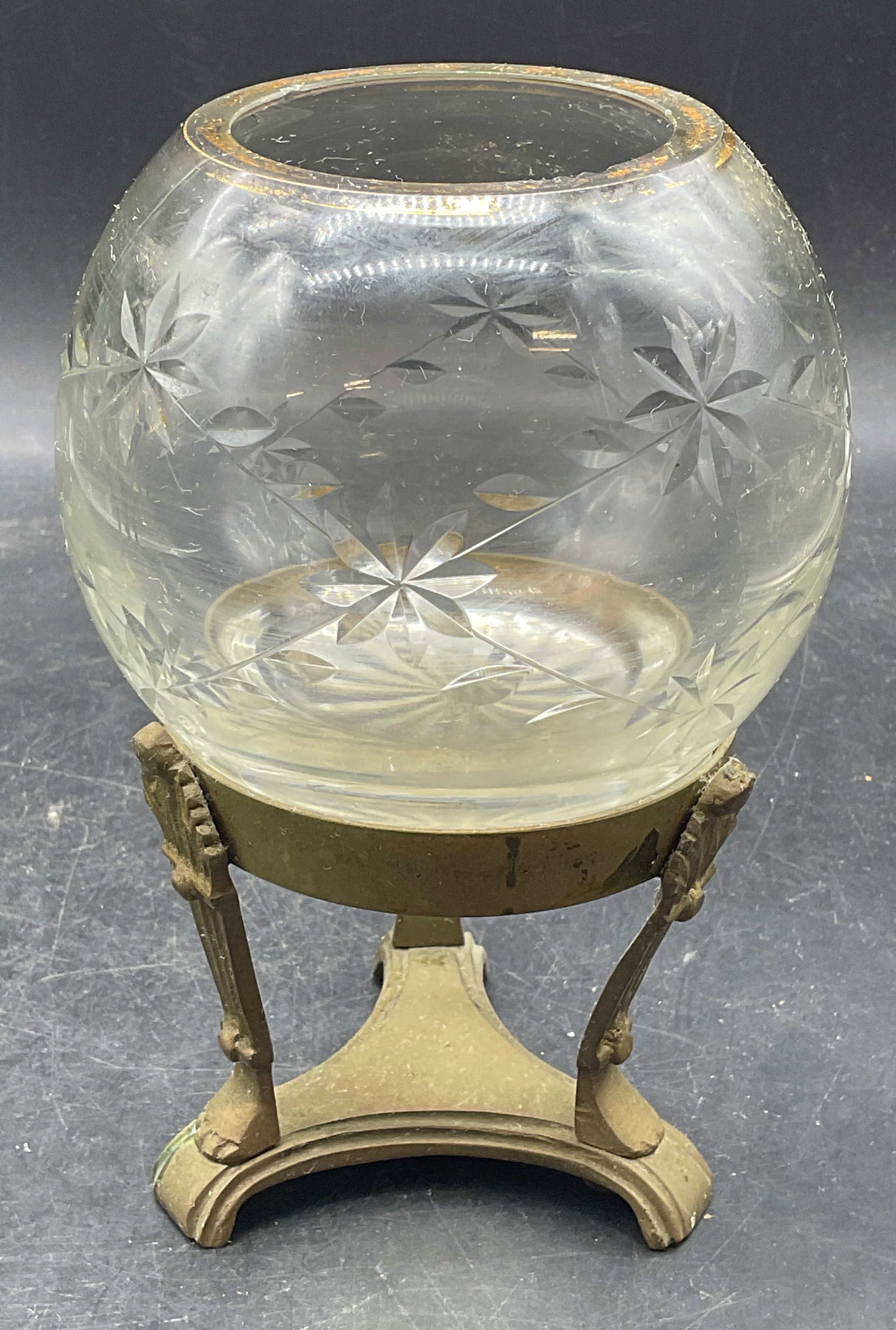 Vtg Cut Crystal Rose Bowl with Brass Stand: Vintage cut crystal rose bowl vase with a brass stand. Floral motif on bowl with gilt rim. Ornate scroll footed tripartite base. Measures approx. 4.5 x 7 inches. Wear including loss to gilt, scratchin