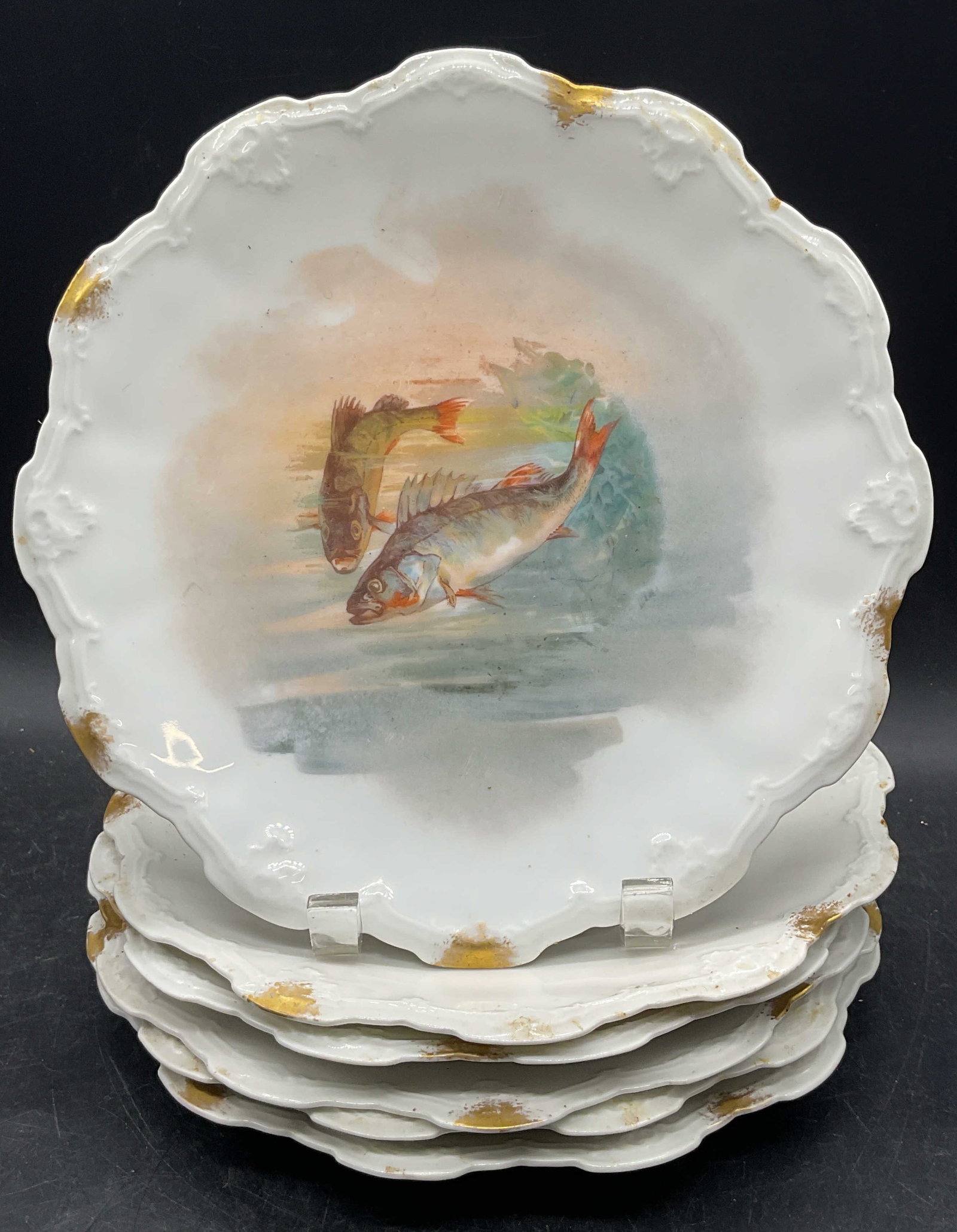 Set 6 Antq LRL Limoges Porcelain Fish Plates FR: Set of 6 LRL Lazeyrus Rosenfeld & Lehman Limoges porcelain plates. Hand painted fish motifs with gilt decoration. Scalloped rims. Made in France. Measures approx. 9.5 inches wide. Al, pieces have
