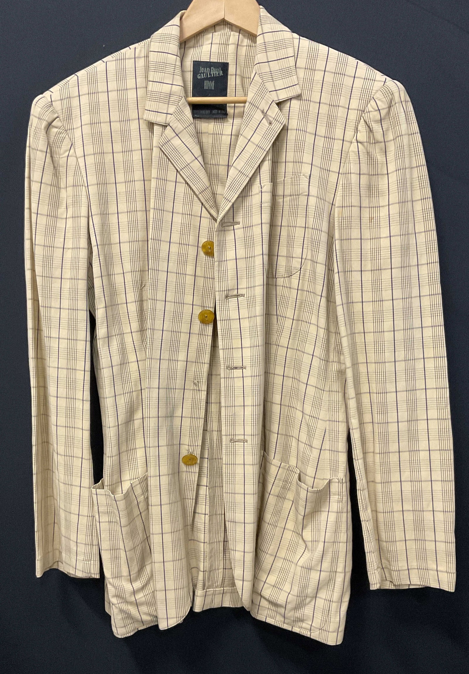 Vintage Jean Paul Gaultier Homme Blazer ITALY: Vintage Jean Paul Gaultier Homme Blazer. Made in Italy. Cotton. Tan with Blue Multi-Grid Patterns. Chunky Clear Brown Buttons. EU Size 50 (Translates to US Size 40R). Some Staining and Fraying. One