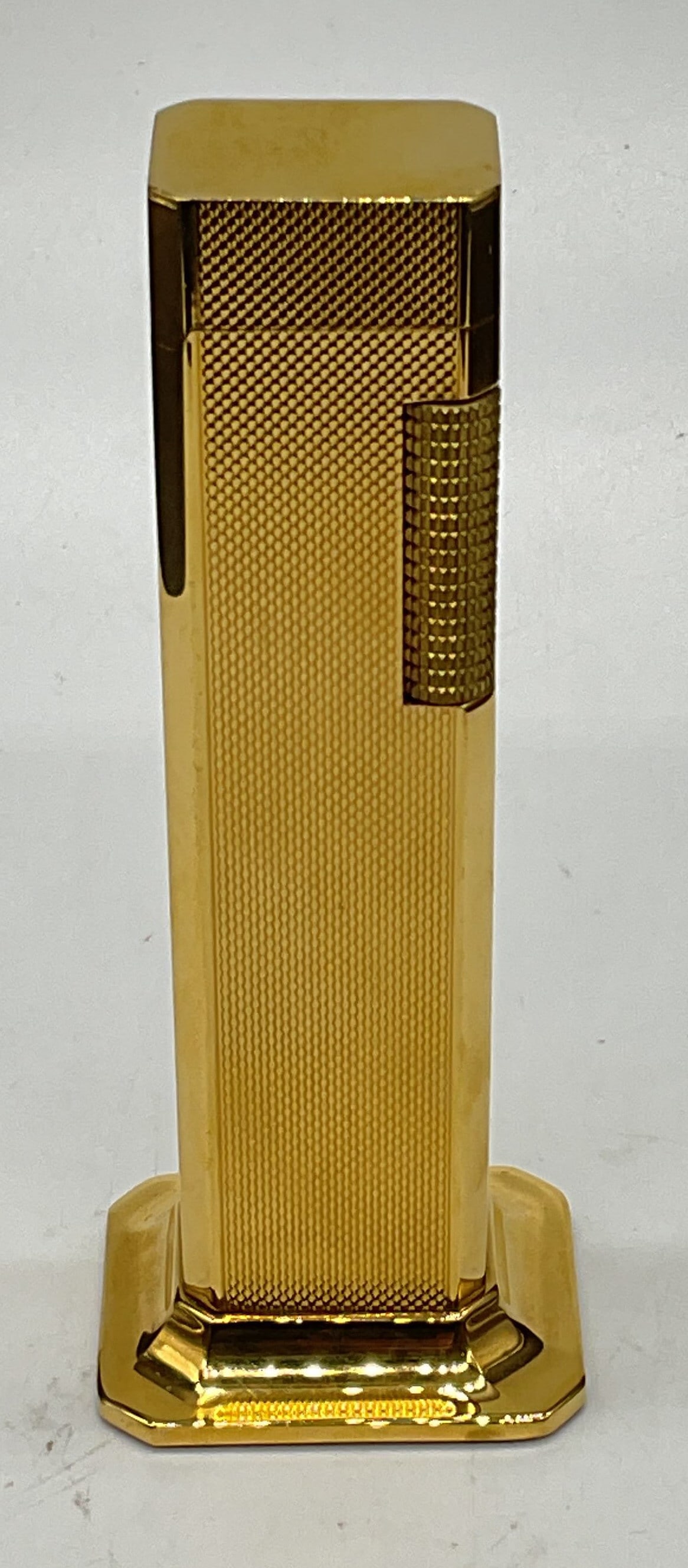 DUNHILL Gold Plated Tallboy Lighter England 4.25in: Vintage Dunhill Tallboy table lighter. Gold plated. Made in England. Measures approx. 1.5 x 1.25 x 4.25 inches. Not tested. Some scratching. DUNHILL lighter, DUNHILL tallboy, tallboy lighter, table