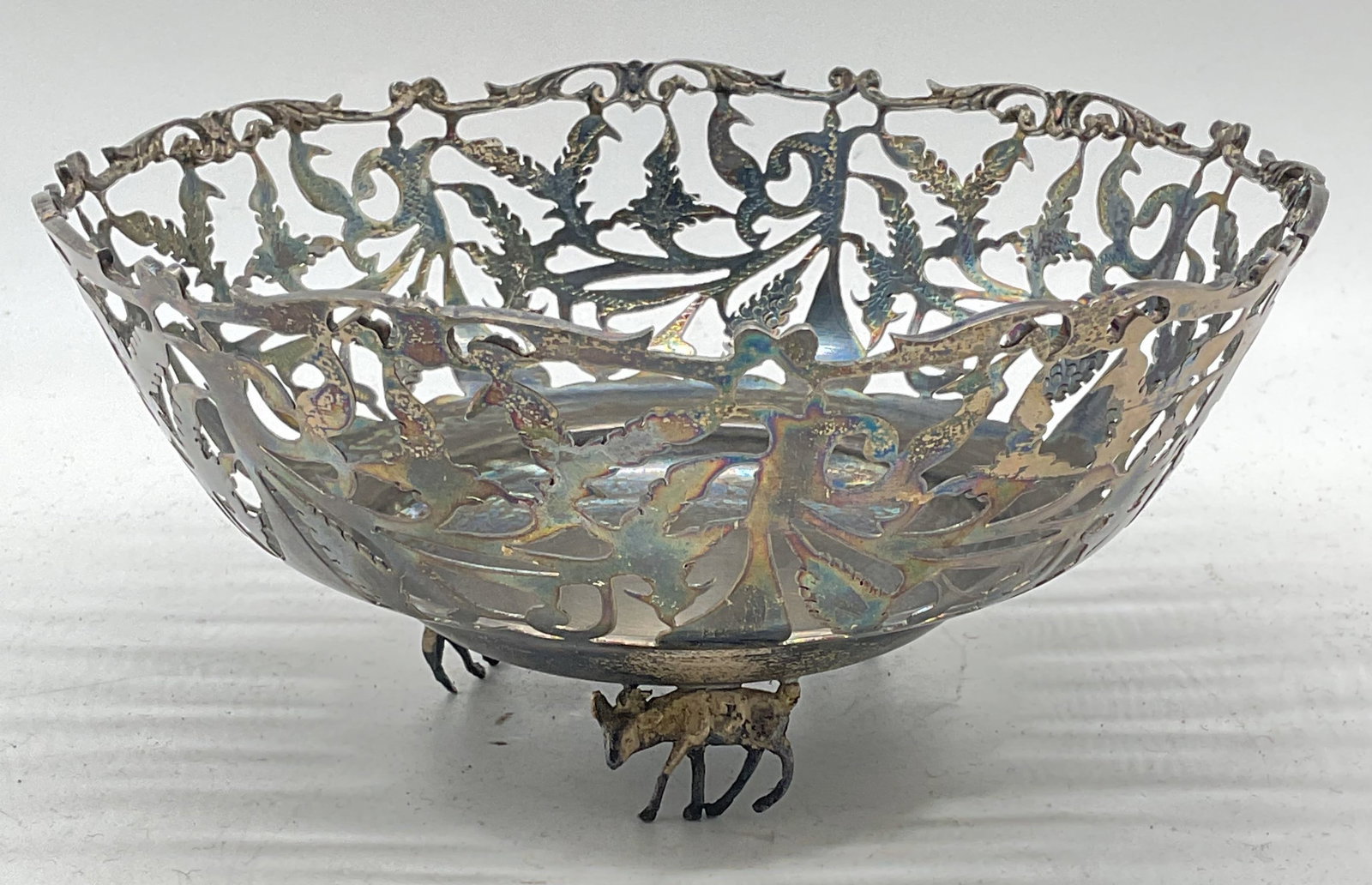 900 Silver Reticulated Hyena Foot Bowl, Egypt: 900 silver bowl with reticulated ornate foliate design and hyena form footed base. Egyptian silver hallmarks on underside. Marked 900 silver. Measures approx. 8.25 x 3.75 inches. Total weight 337.6