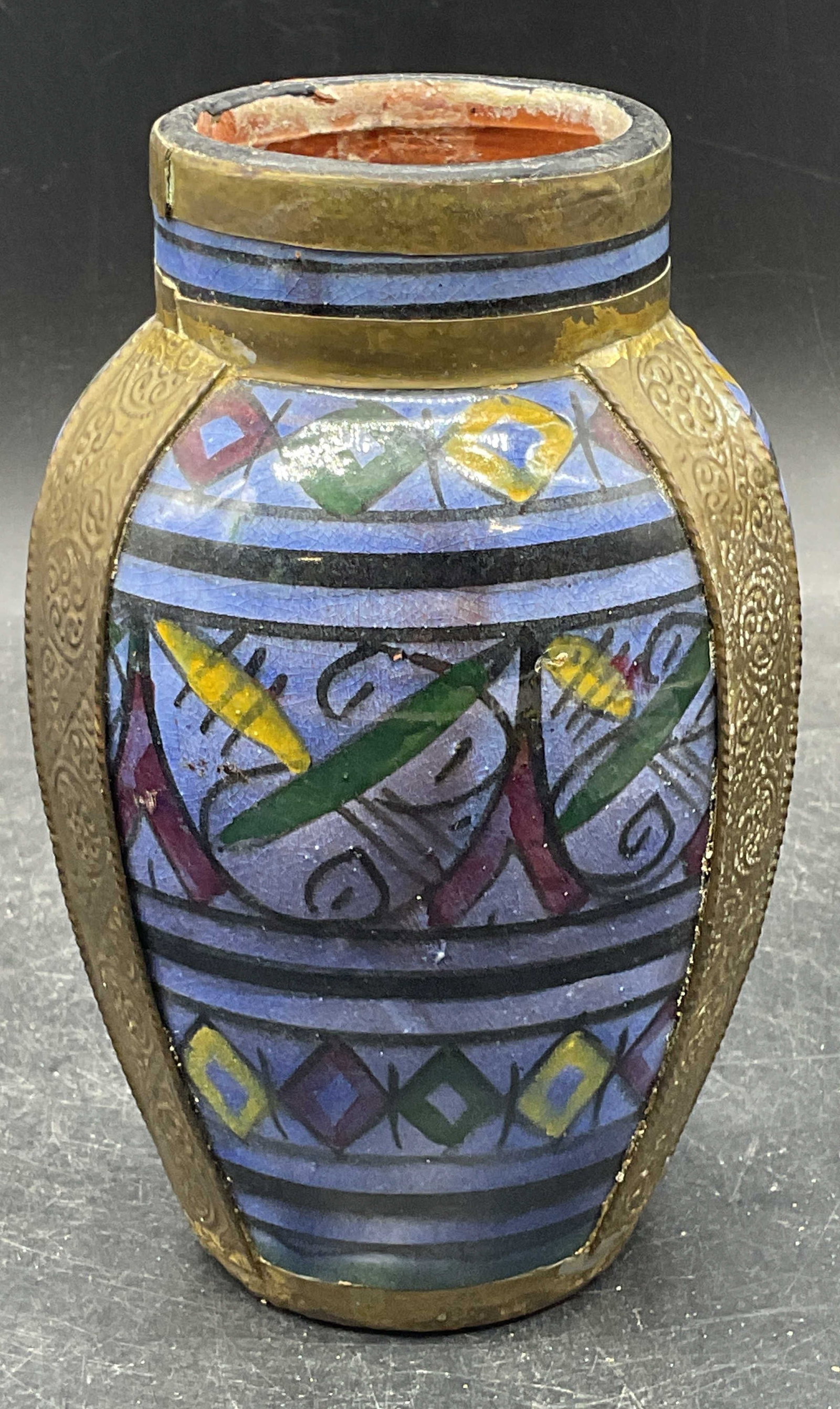 Vintage Moroccan Safi Pottery Brass Vase: Vintage Safi pottery vase with brass accents. Hand pated blue with traditional geometric design. Made in Morocco. Measures approx. 4 x 6.75 inches. Wear including small chips, patina, scratching,