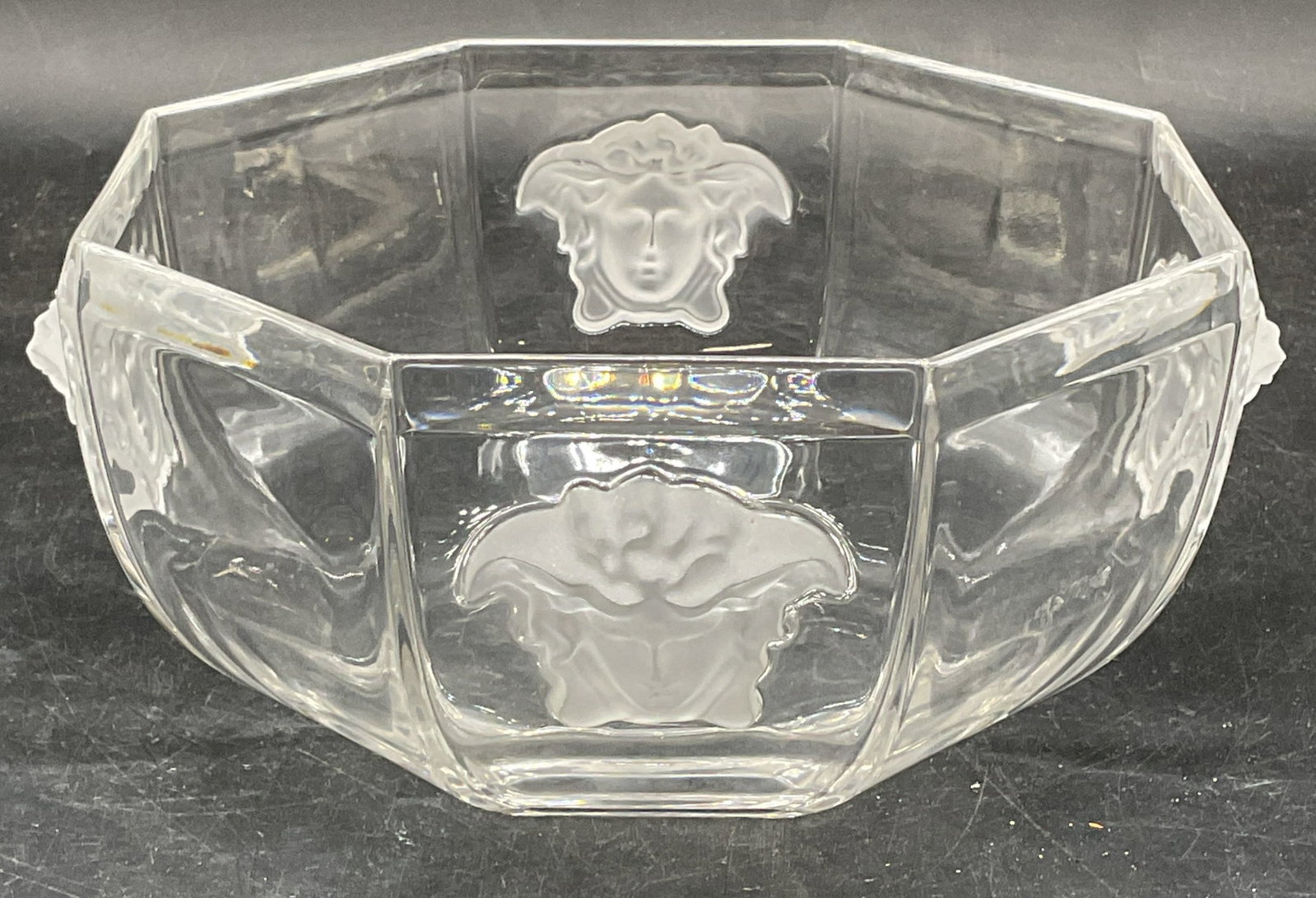 Medusa Head Frosted Crystal Octagonal Bowl: Clear and frosted crystal octagonal shaped bowl with raised media head motif. Style of Versace for Rosenthal, no signature or markings. Measures approx. 7 x 7 x 3.5 inches. Some scratching. Medusa