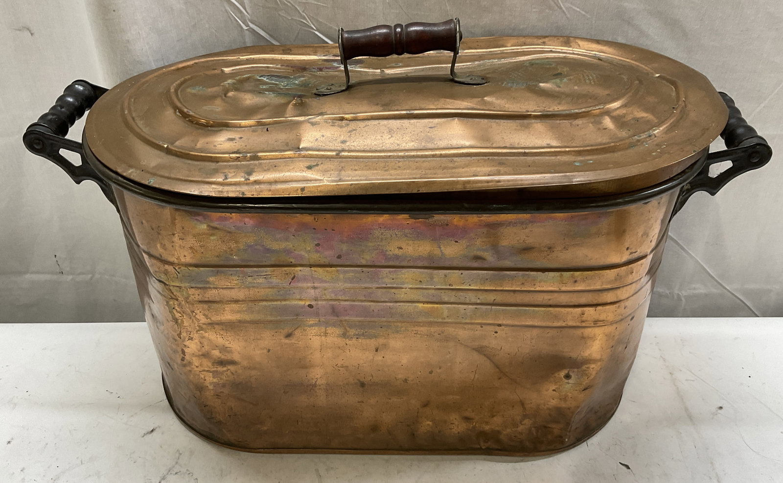 ANTIQUE 17x27in Copper Boiler w/ Wood Handles: Antique Copper Boiler with Wood Handles. Surface Wear Present Such As Denting and Scratching. Lid Needs Adjustment. Some Spots Have Green Patina. Measures app 17in H x 27in L. Antique Copper Boiler,