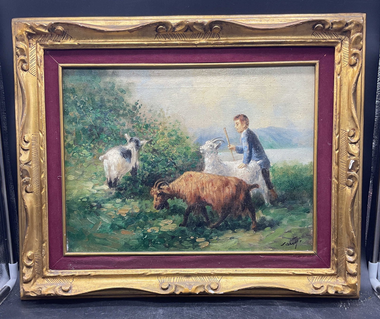 Framed Signed Pastoral Goats Oil Painting: Framed oil on canvas painting. Signed lower right illegibly. Pastoral landscape scene with goats and figure. Ornate gilt wood frame. Not examined out of frame. Frame measures approx. 17.5 x 21.25