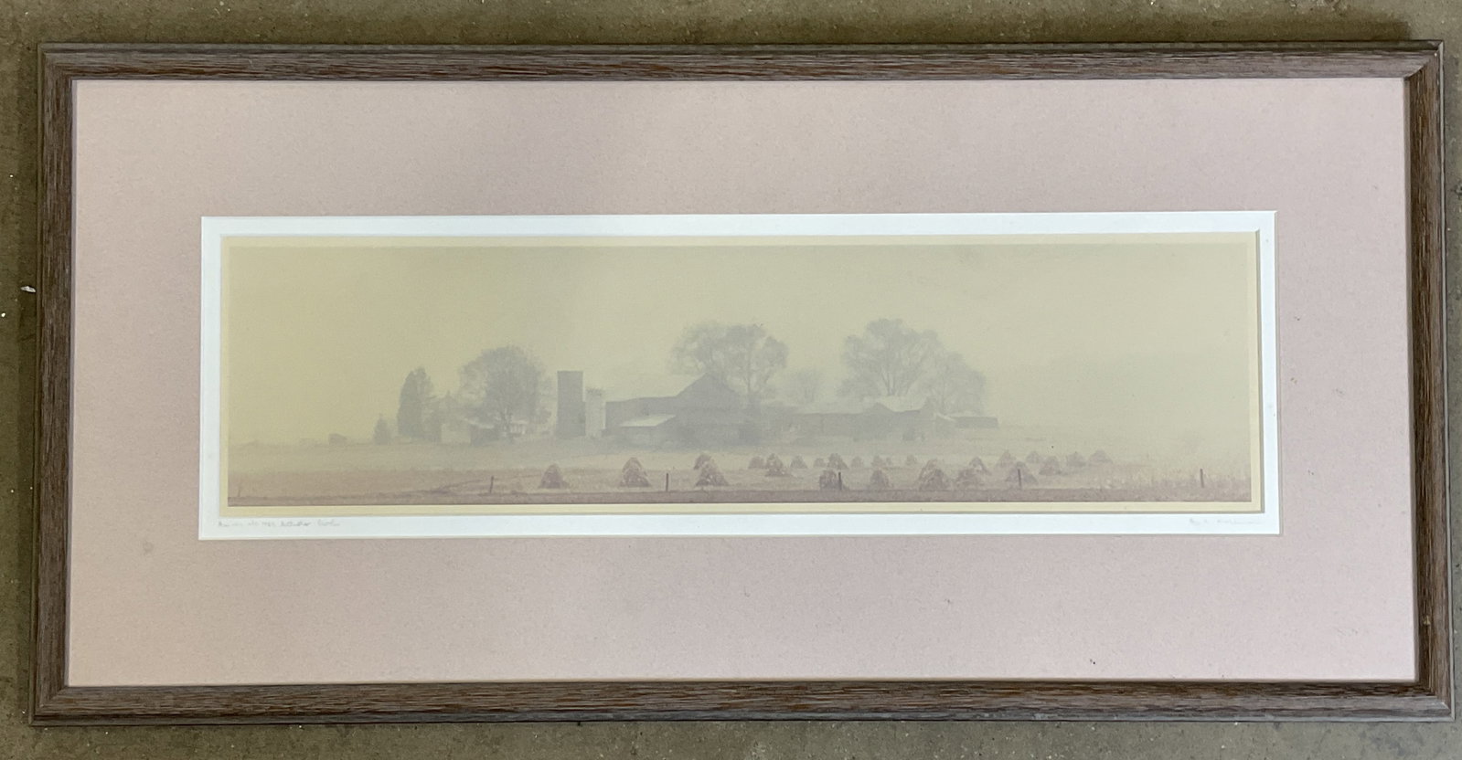 Signed Bill Coleman Amish No 483 Lithograph: Framed and double matted lithograph in color. Signed on the mat Bill Coleman (Australian, 1922-1993). Proof. Amish No 483. Landscape with barn and hay bales. Wood frame. Not examined out of frame.