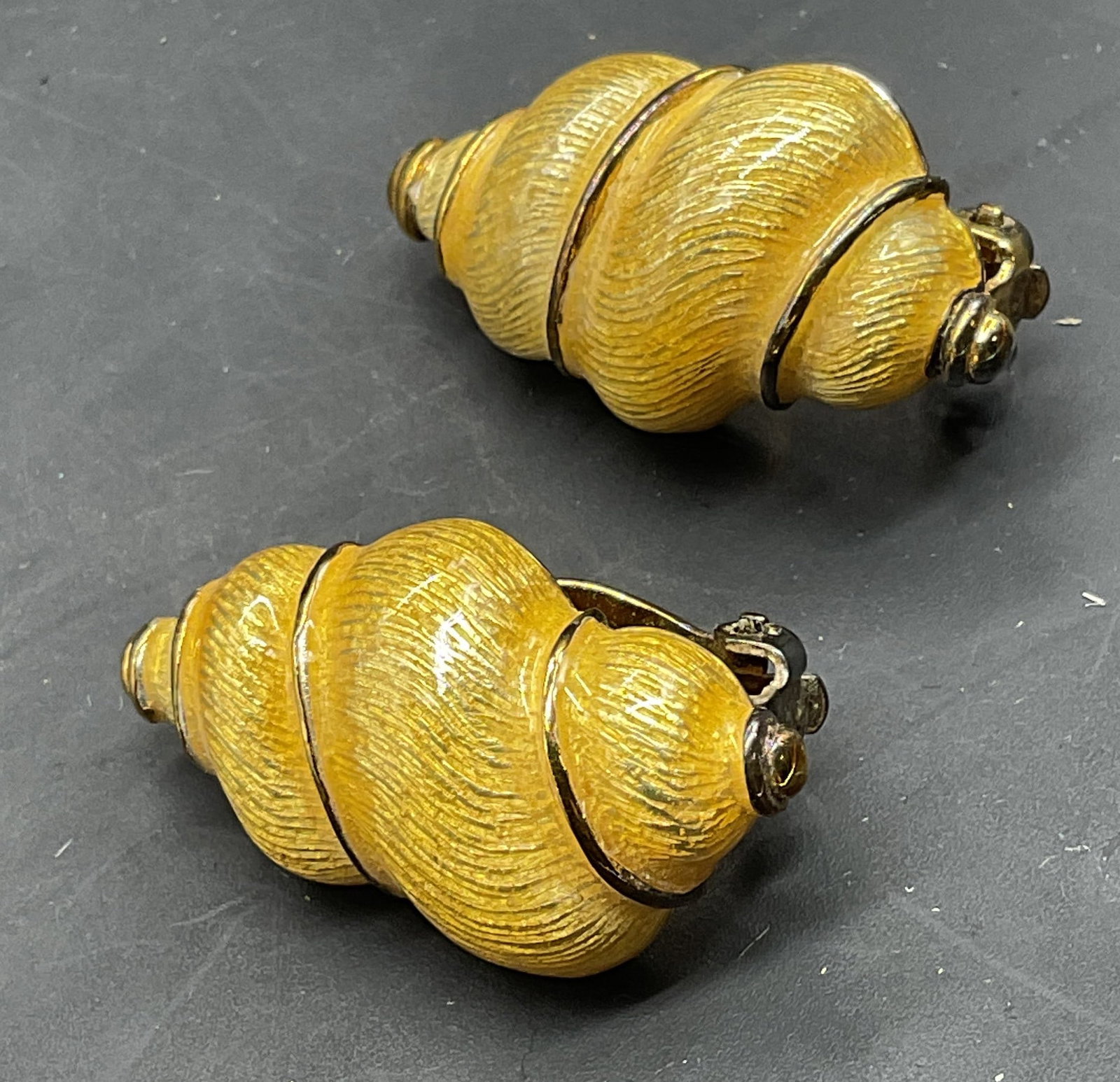 Carolee Gold Tone Enamel Seashell Earrings: Vintage Carolee gold tone enamel seashell motif earrings. Measures approx. 1.25 inches long. Some scratching. Jewelry, estate jewelry, costume jewelry, cocktail jewelry, fashion jewelry, accessories,