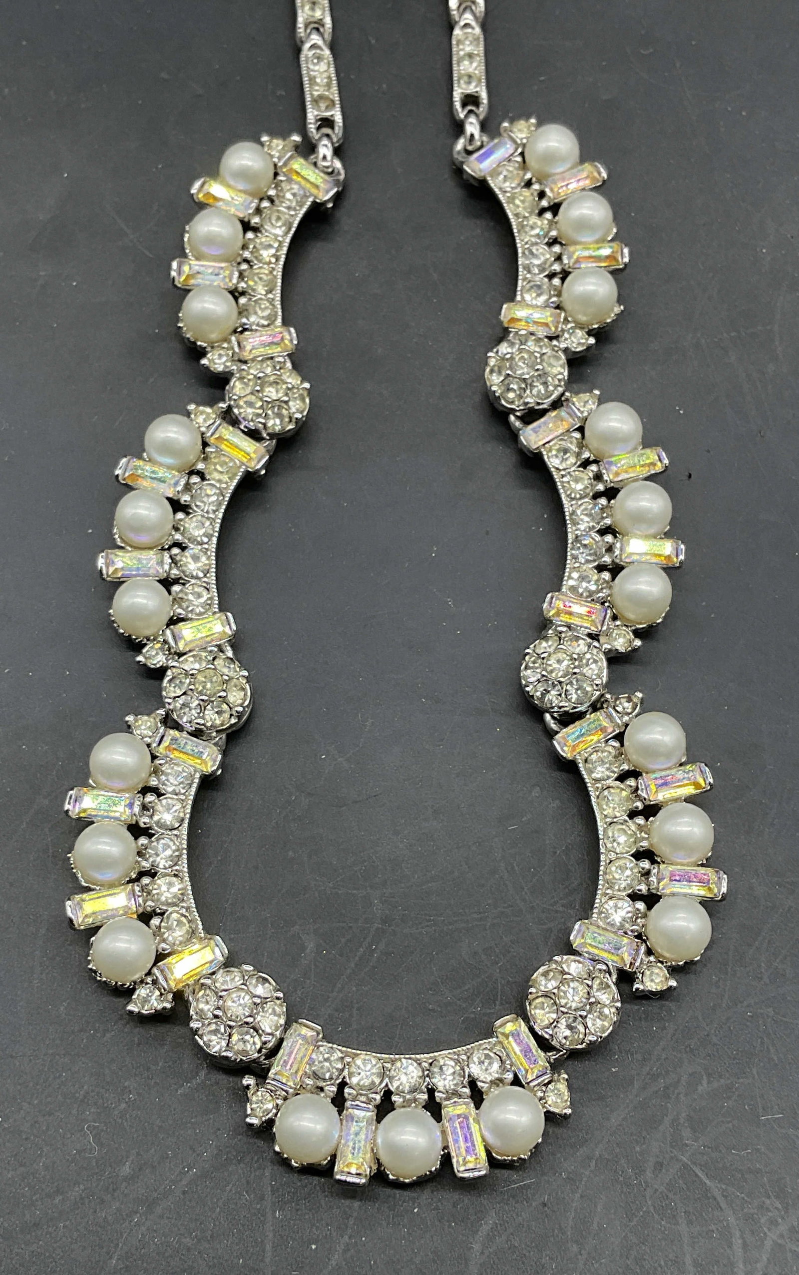 Bogoff Silver Tone Faux Pearl Crystal Necklace: Vintage Bogoff silver tone necklace with faux pearls and crystals. Drop length 10.25 inches. Some crystals need replacement. Some scratching. Jewelry, estate jewelry, costume jewelry, cocktail