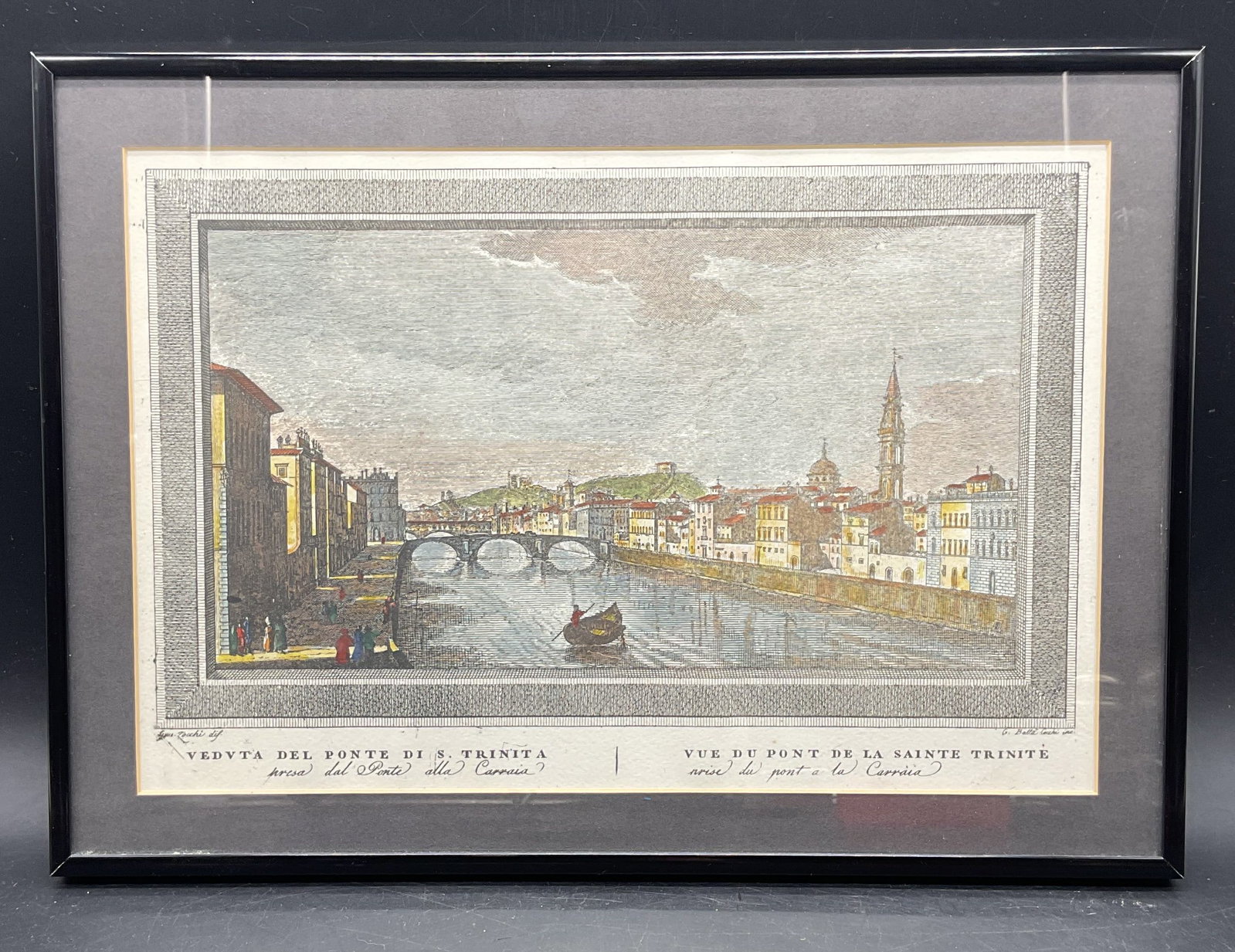 After Zocchi Ponte Santa Trinita Italy Engraving: Framed color engraving. After Giuseppe Zocchi, Ponte Santa Trinita, Florence, Italy. Print date unknown. Black frame. Not examined out of frame. Frame measures approx. 10.25 x 14.25 inches. Some wear