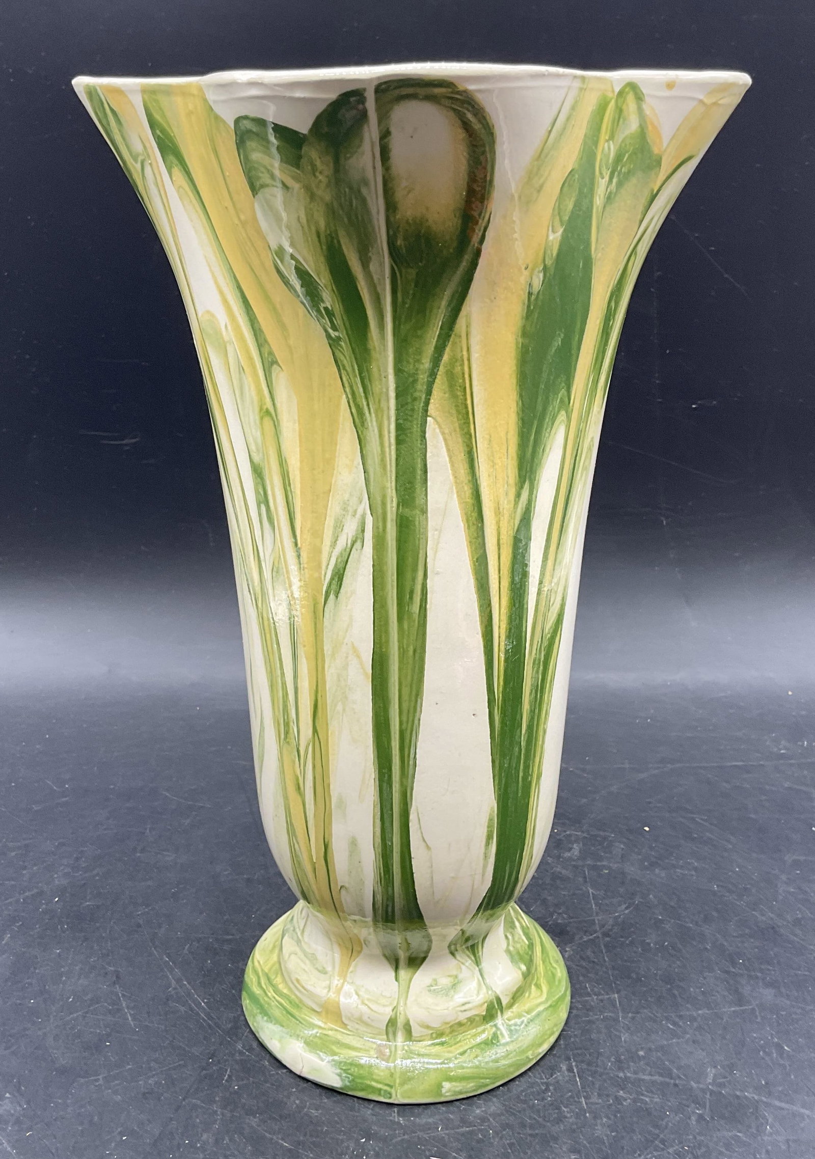 Hand Painted Green Drip Ceramic Vase: Hand painted ceramic vase with fluted scalloped rim. Green drip design. Measures approx. 6.25 x 10.25 inches. Some scratching. Ceramic vase, green vase, drip vase, home decor, table decor, 10 cs