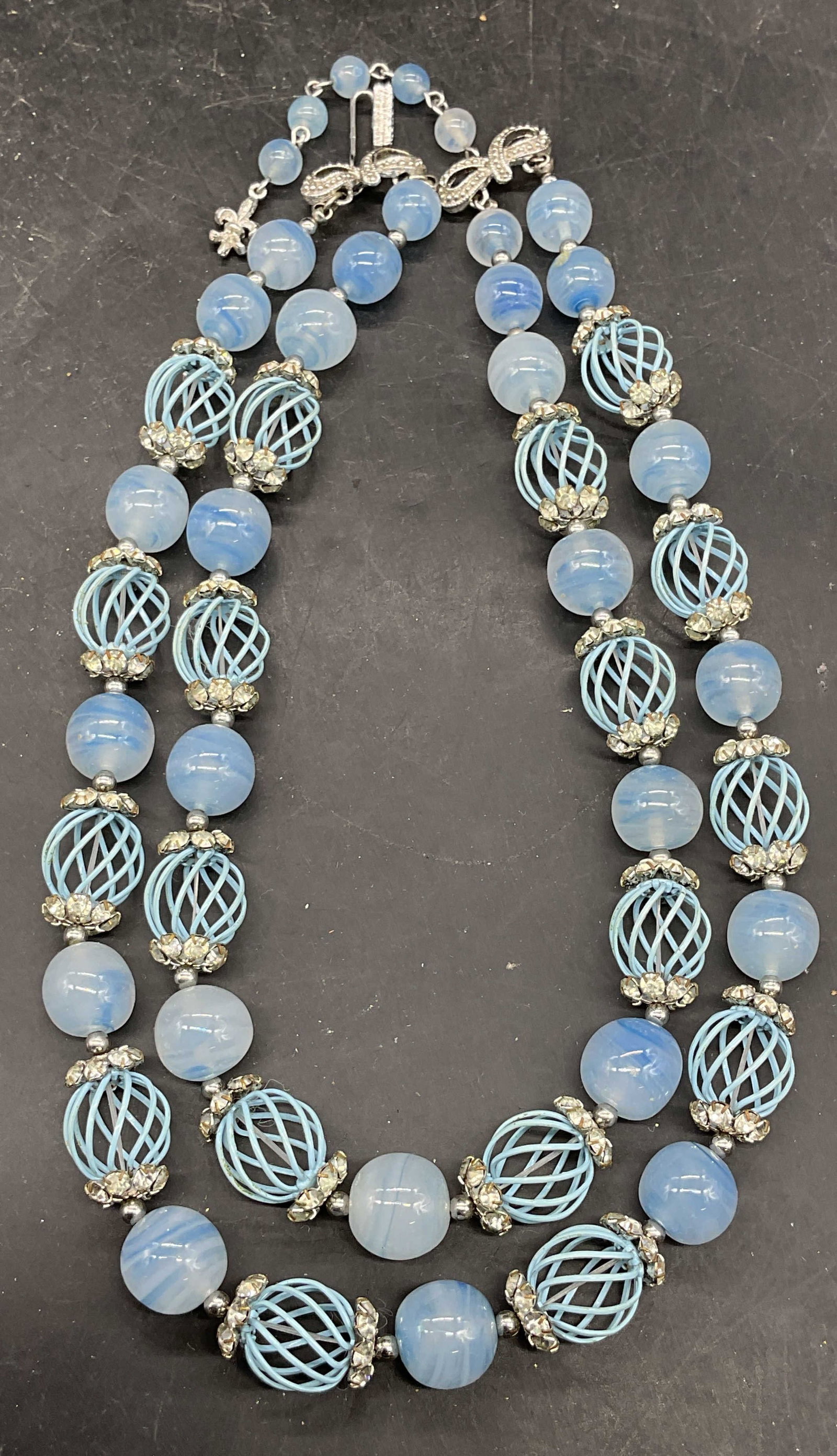 Vtg Vendome Blue Art Glass Beaded Necklace: Vintage Vendome blue art glass and wire beaded double strand necklace with crystal accents. Drop length 7.5 inches. Includes a box. Some scratching. Jewelry, estate jewelry, costume jewelry, fashion