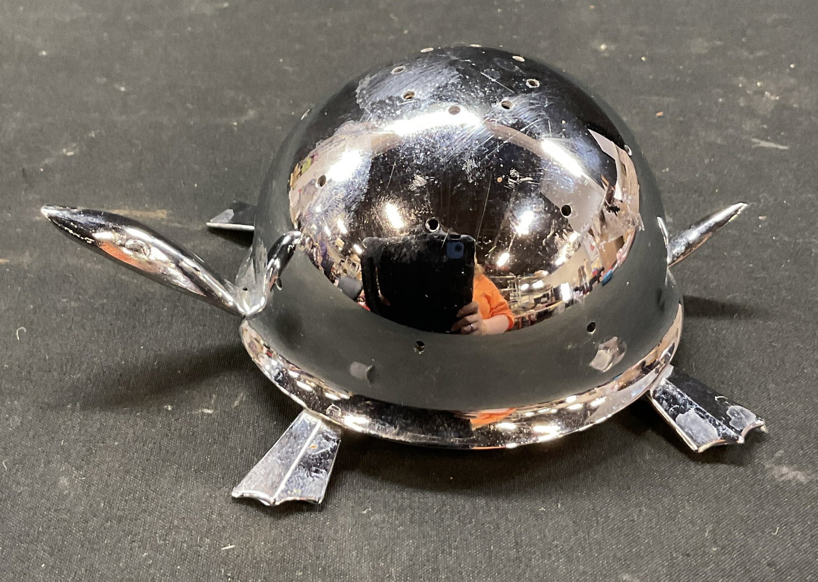 Irvinware Silver Tnd Turtle Toothpick Holder USA: Irvinware silver toned mock turtle toothpick holder. Marked on underside, reads Irvinware Mock Turtle Made In USA. Turtle figure. Multiple holes on surface. Measures approx 3.5 x 5.5 x 2 inches. Some