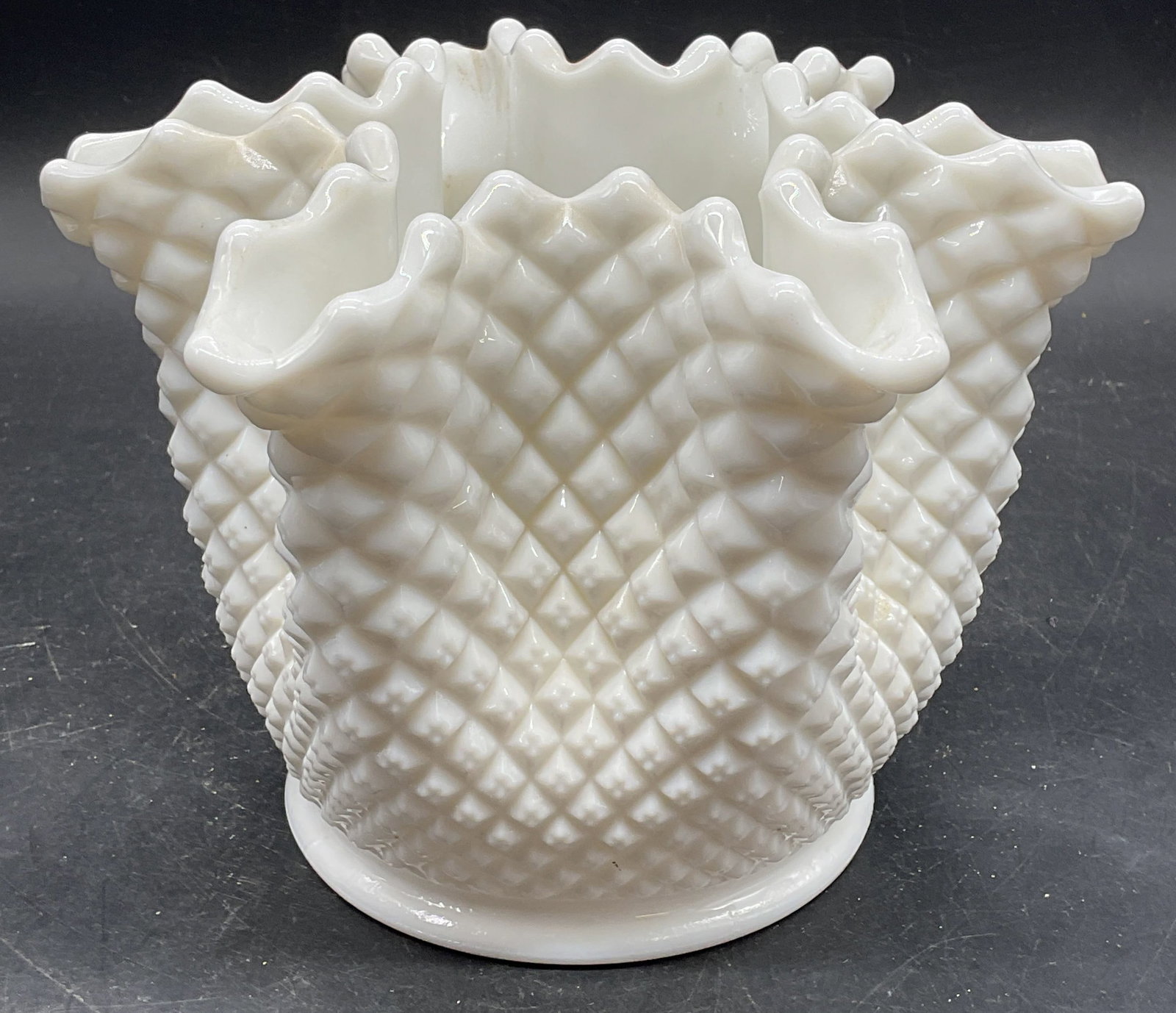 Vintage Diamond Handkerchief Milk Glass Vase: Vintage milk glass vase with quilted diamond pattern and handkerchief rim. Style of Westmoreland Glass Company, no signature. Measures approx. 7.5 x 5.75 inches. Thick walled glass, piece has weight.