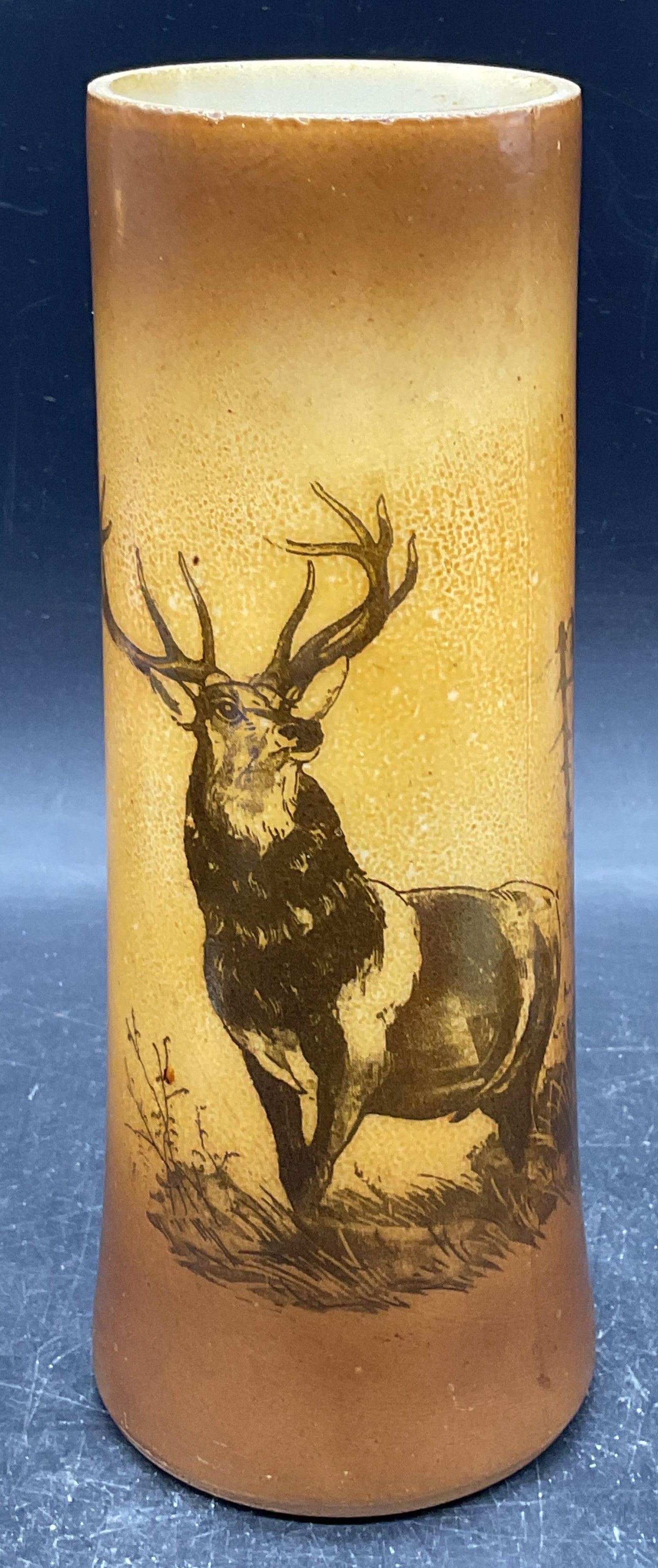 Antique Milk Glass Stag Deer Vase: Antique milk glass vase with stag deer graphic print in brown. Style of Westmoreland Glass Company, no signature. Measures approx. 3.25 x 8.25 inches. Some scratching and loss to graphic. Collectibles