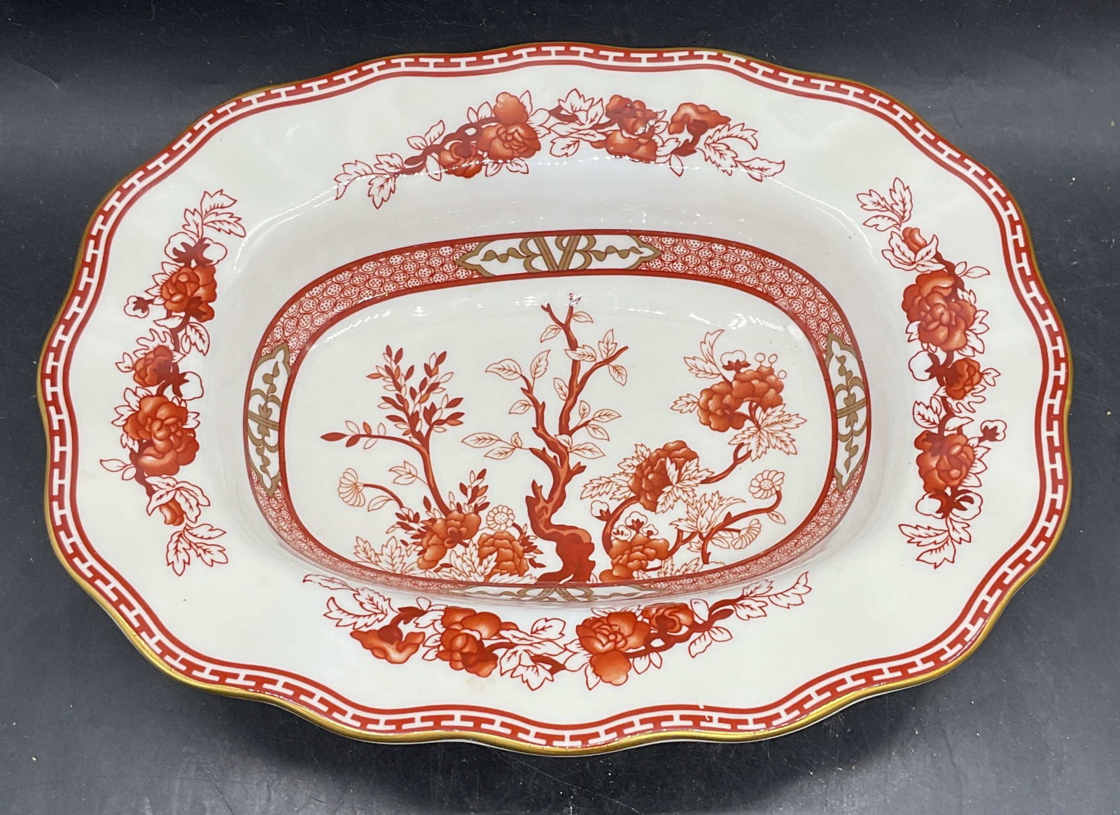 Coalport Indian Tree Fine China Bowl, England: Coalport fine bone china serving bowl. Indian Tree Coral pattern. Hand painted and gilt decoration. Made in England. Measures approx. 10 x 7.75 x 2 inches. Some scratching. Coalport bowl, Indian tree 