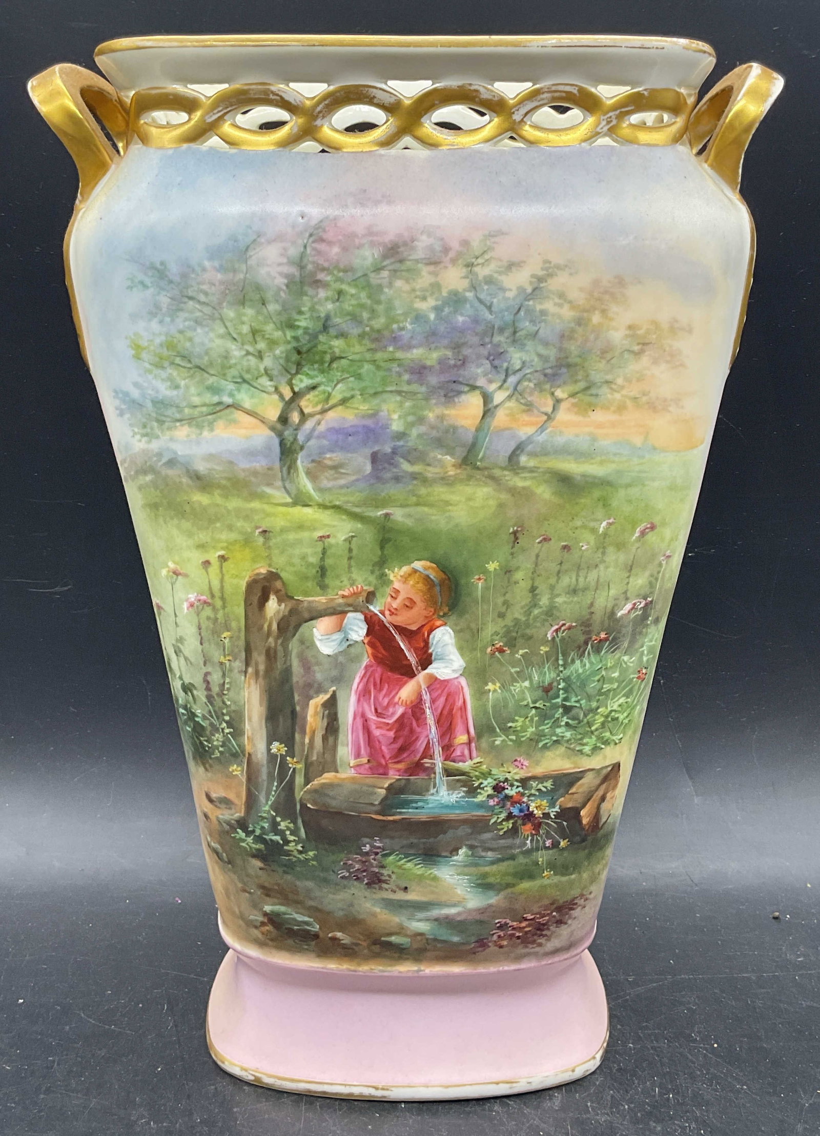 Antique Porcelain Pastoral Scene Vase 12.25 In: Antique porcelain vase. Hand painted pastoral scene with girl at well. Gilt decoration. Measures approx. 8.5 x 5.5 x 12.25 inches. Wear including scratching and loss to paint. Antiques, collectibles, 
