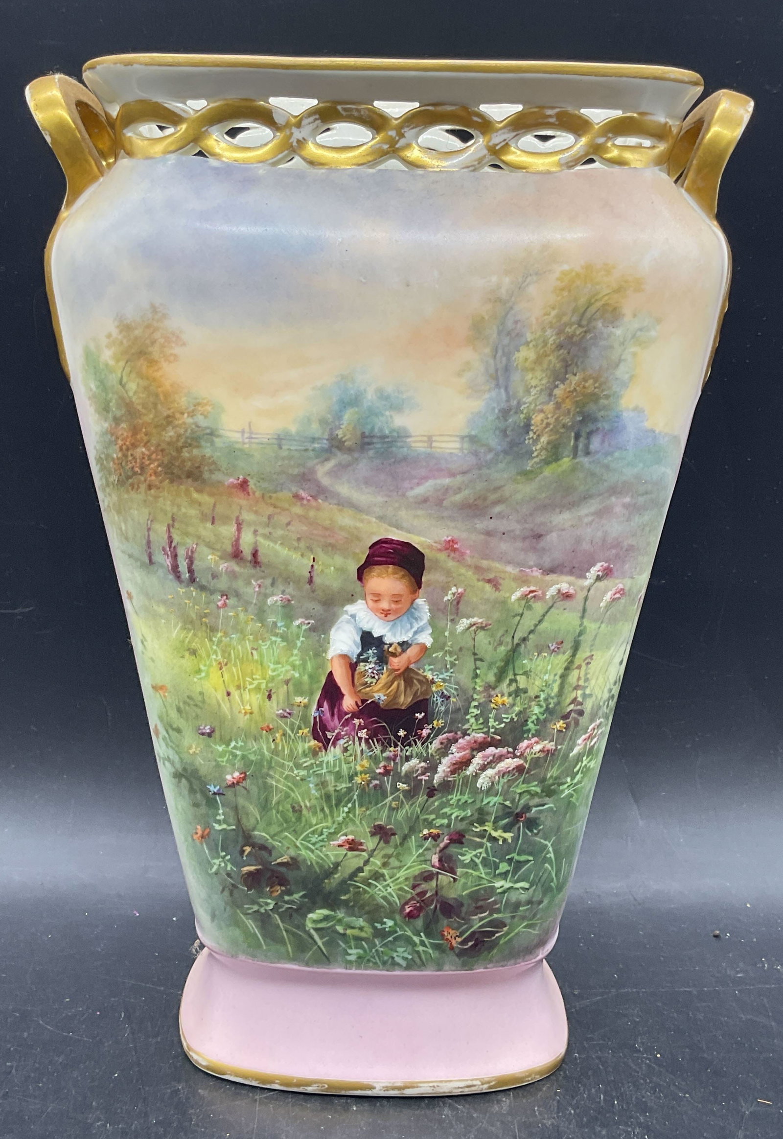 Antique Pastoral Scene Porcelain Vase 12.25 In: Antique porcelain vase. Hand painted pastoral scene with girl picking flowers. Gilt decoration. Measures approx. 8.5 x 5.5 x 12.25 inches. Wear including scratching and loss to paint. Antiques, collec