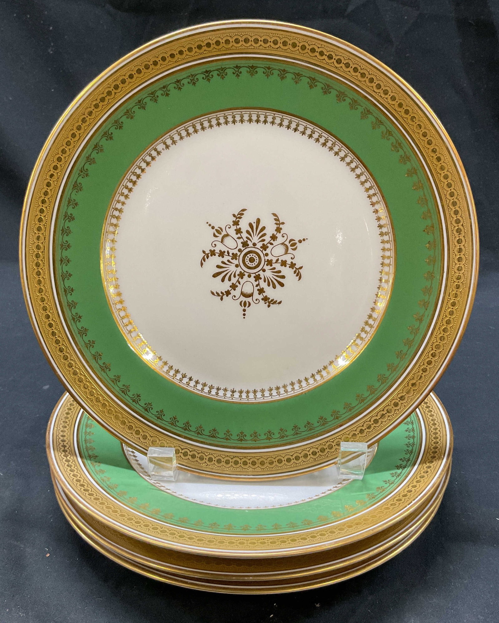Set 4 L. Bernardaud Limoges Plates France: Set of 4 L. Bernardaud Limoges porcelain plates. Marked on underside, reads B & Co France L. Bernardaud & Co Limoges. Signature underneath, reads illegibly. Round plates with gilt rim. Green and gilt 