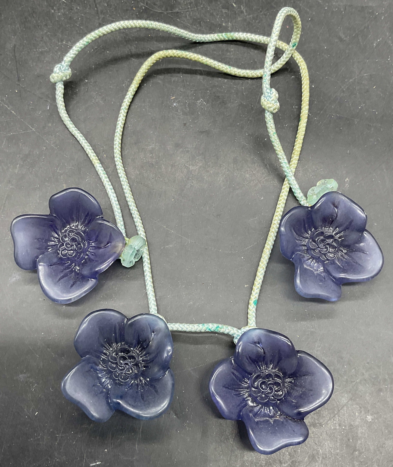 Vintage Blue Lucite Chunky Flower Necklace: Vintage chunky blue lucite flower pendant necklace on blue cord. Drop length 12 inches, includes a jewelry pouch. Some scratching and blemishes. Jewelry, estate jewelry, costume jewelry, cocktail jewe
