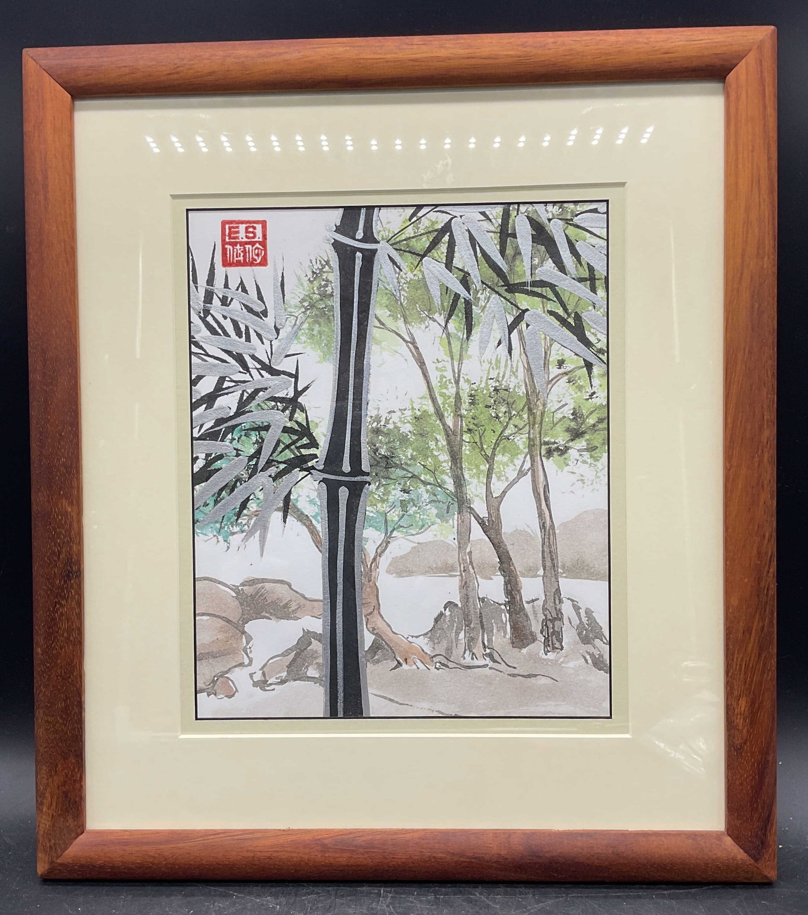 Signed E. S. Bamboo Mixed Media Painting: Framed and matted mixed media painting on paper. Signed with red seal E. S. ant upper left. Bamboo and landscape. Wood frame. Not examined out of frame. Frame measures approx. 17 x 15 inches. Some