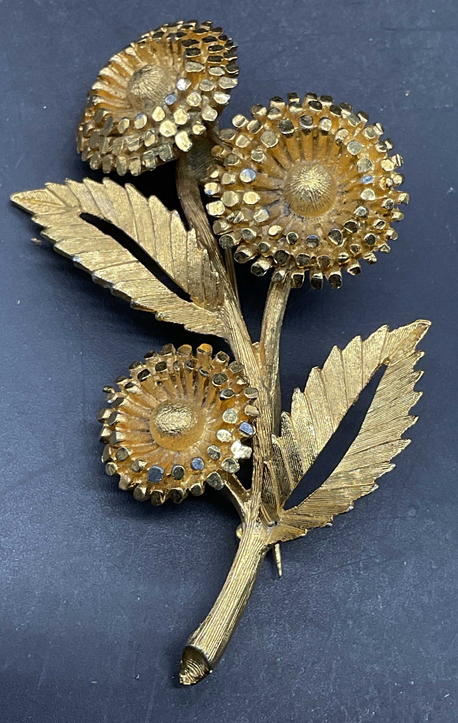 Vintage BSK Gold Tone Flower Brooch 2.75 in Long: Vintage BSK gold tone flower statement brooch. Measures approx. 2.75 x 1.75 inches. Some scratching. Jewelry, estate jewelry, costume jewelry, cocktail jewelry, fashion jewelry, accessories, fashion a