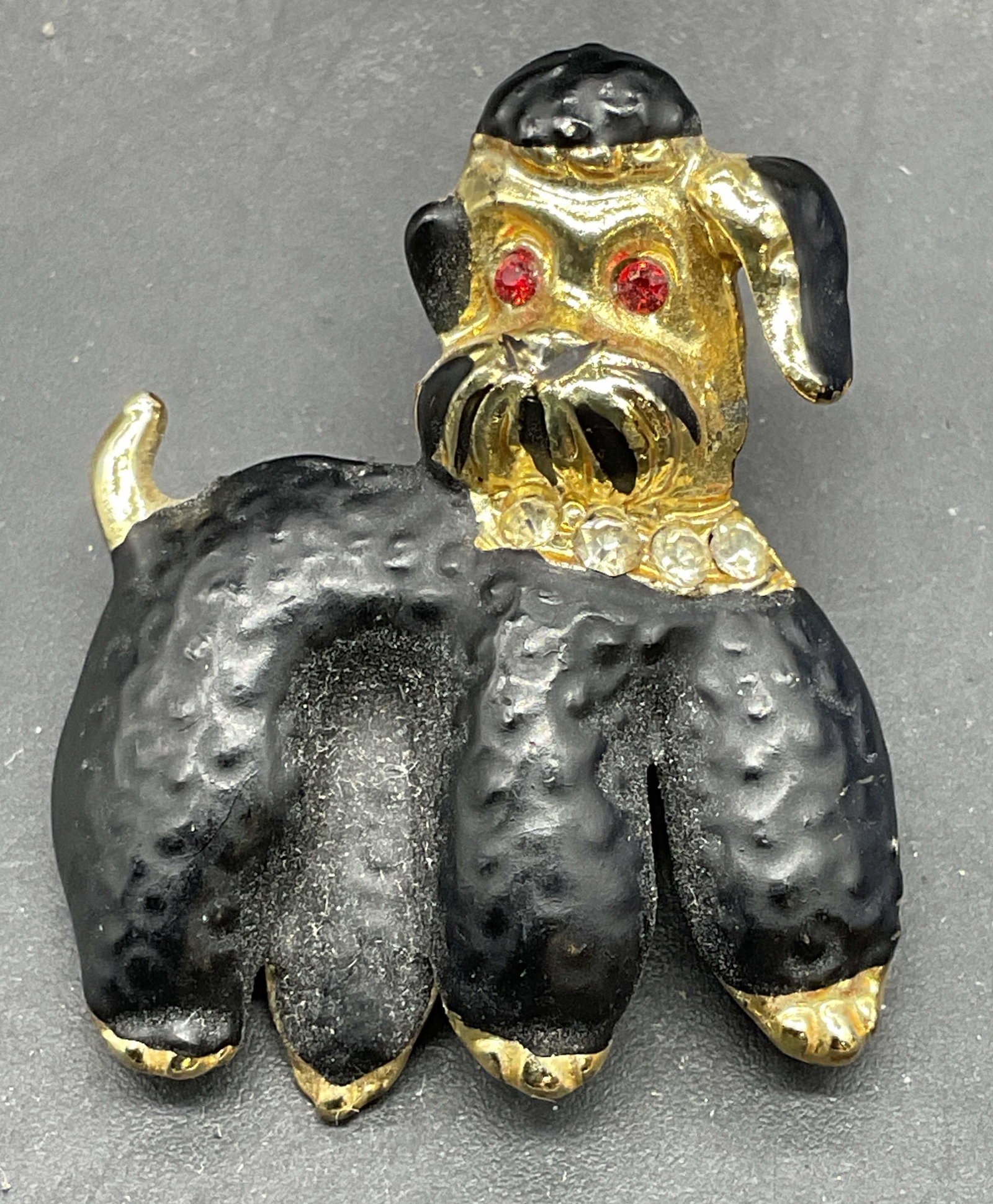 Vintage Gold Tone Enamel Poodle Brooch: Vintage gold tone enameled poodle brooch with crystals. Measures approx. 1.25 x 1 inches. Some scratching. Jewelry, estate jewelry, costume jewelry, cocktail jewelry, fashion jewelry, accessories,