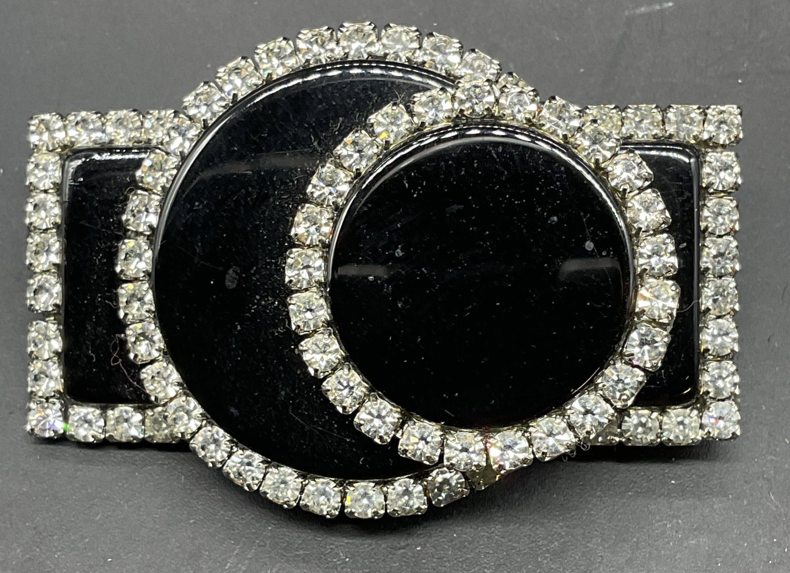 Vintage Art Deco Style Black Crystal Brooch: Vintage art deco style geometric brooch in black with colorless crystals. Measures approx. 1.25 x 2 inches. Some scratching. Jewelry, estate jewelry, costume jewelry, cocktail jewelry, fashion