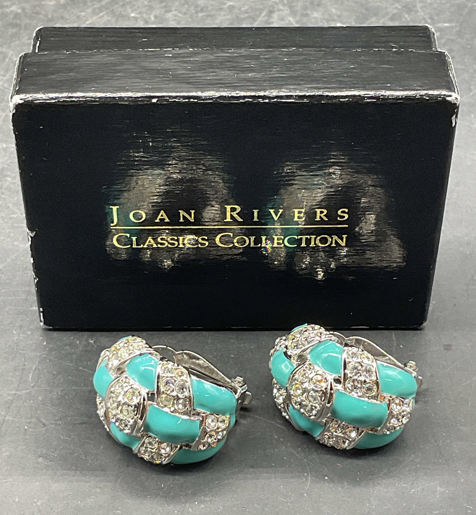 VTG Joan Rivers Enamel Crystal Earrings NIB: Vintage Joan Rivers silver tone blue enamel and colorless crystal earrings. New in box. Measures approx. 1.25 inches long. Some wear consistent with exposure. Jewelry, estate jewelry, costume
