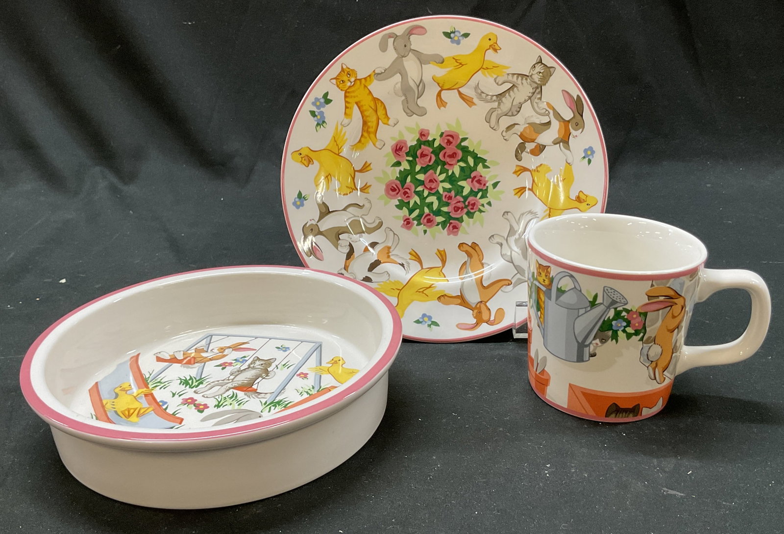 3 1992 Tiffany & Co Tiffany Playground Tblw Japan: 3 piece 1992 Tiffany & Co porcelain Tiffany Playground tableware. Marked on underside, reads Tiffany Playground By Tiffany & Co Made In Japan 1992. Includes plate, bowl, and mug. Depicts various