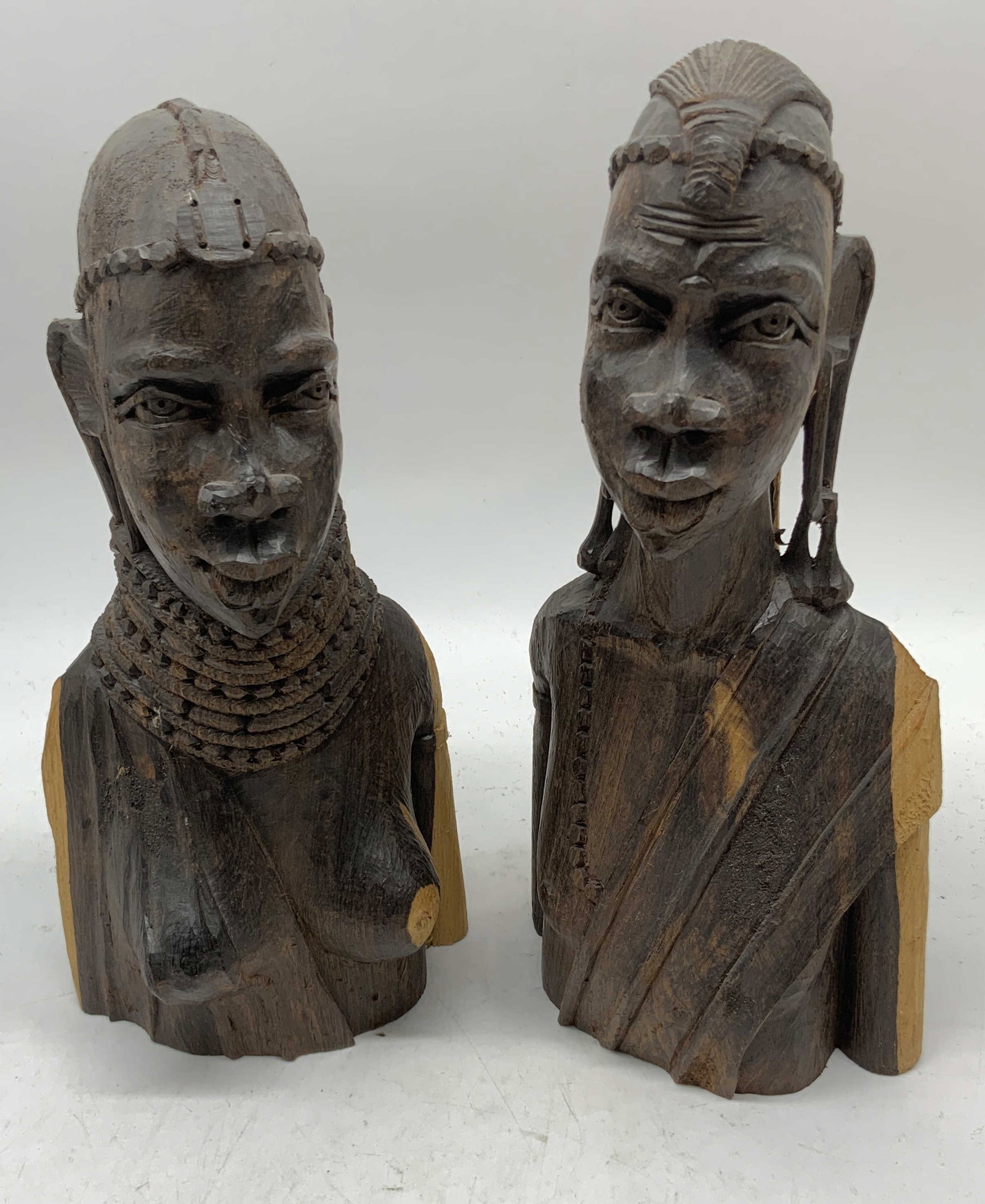 Lt2 Hand-Carved African Ebony Wood Busts: 2 Hand-Carved African Ebony Wood Busts. Male and Female. Condition Consistent With Exposure. Measures app 10.25in H x 5in L. Carved Wood, African Statues, Ebony Wood, Busts, African Art, African