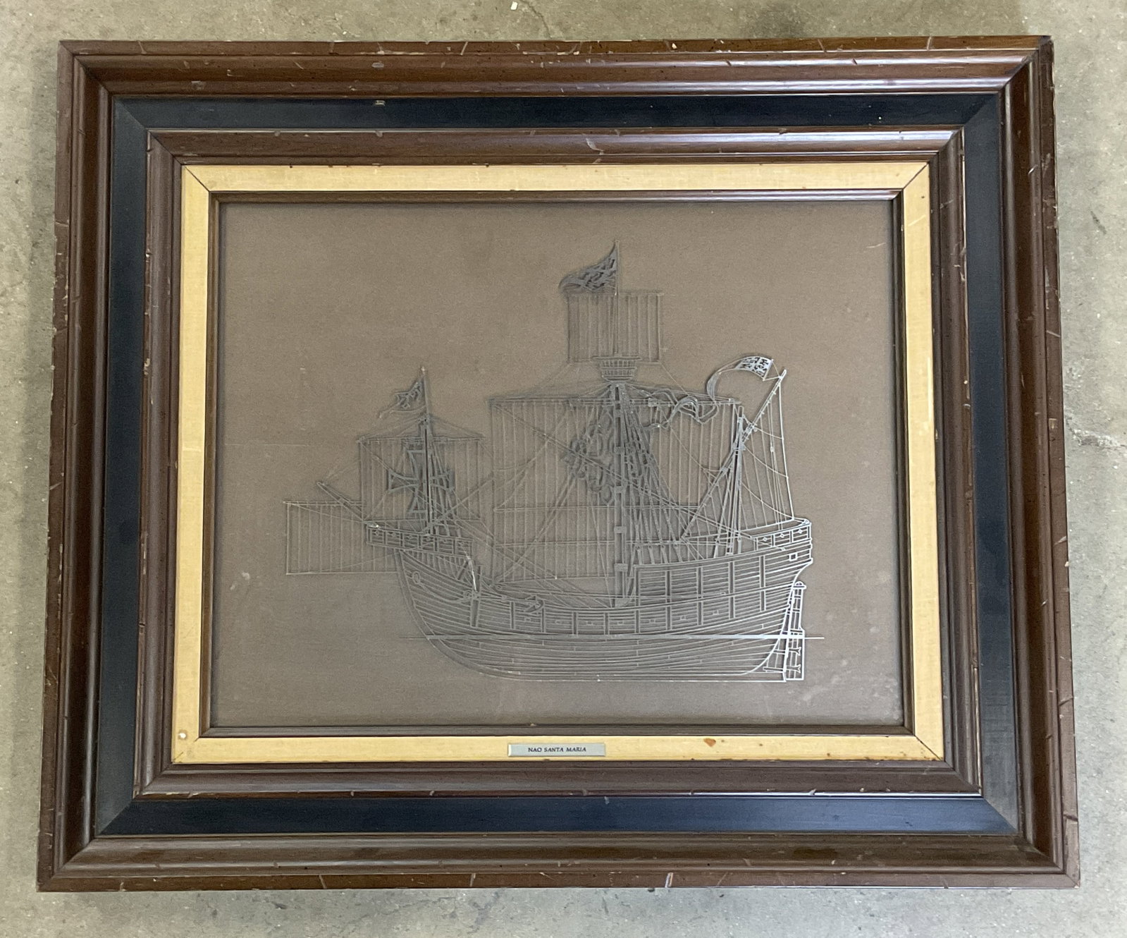 Franklin Mint Santa Maria Sterling Silver Ship: Framed 1976 Franklin Mint sterling silver ship silhouette. Nao Santa Maria. Wood frame. Not examined out of frame. Frame measures approx. 21.25 x 25.25 inches. Wear including scratching. Sterling