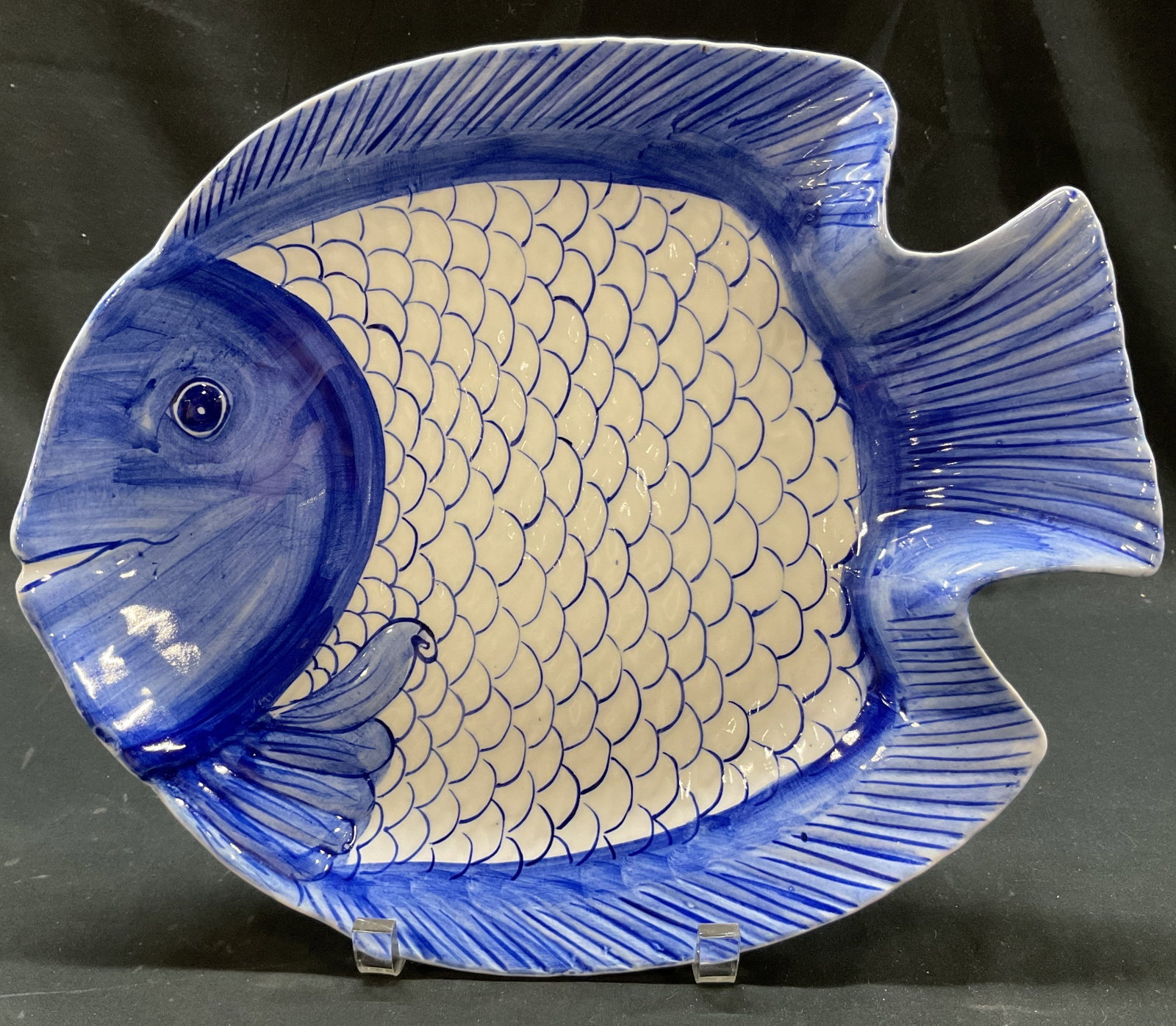 Cadeaux Ceramic Blue & White Fish Plate Thailand: Cadeaux ceramic blue and white fish plate. Made in Thailand. Marked on underside as photographed here. Plate shaped like a dish. Hand painted details and features in blue. Glossy finish. Measures