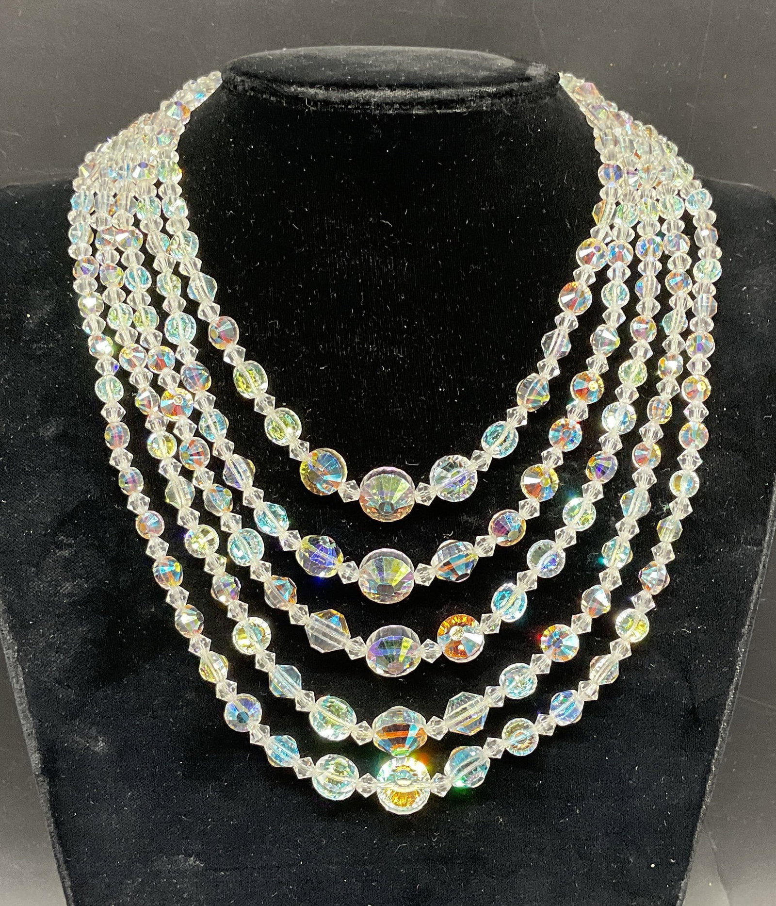 Vintage Colorless Crystal 5 Strand Necklace: Vintage colorless crystal beaded 5 strand necklace. Drop length 7.25 inches. Some scratching. Jewelry, estate jewelry, costume jewelry, cocktail jewelry, fashion jewelry, accessories, fashion