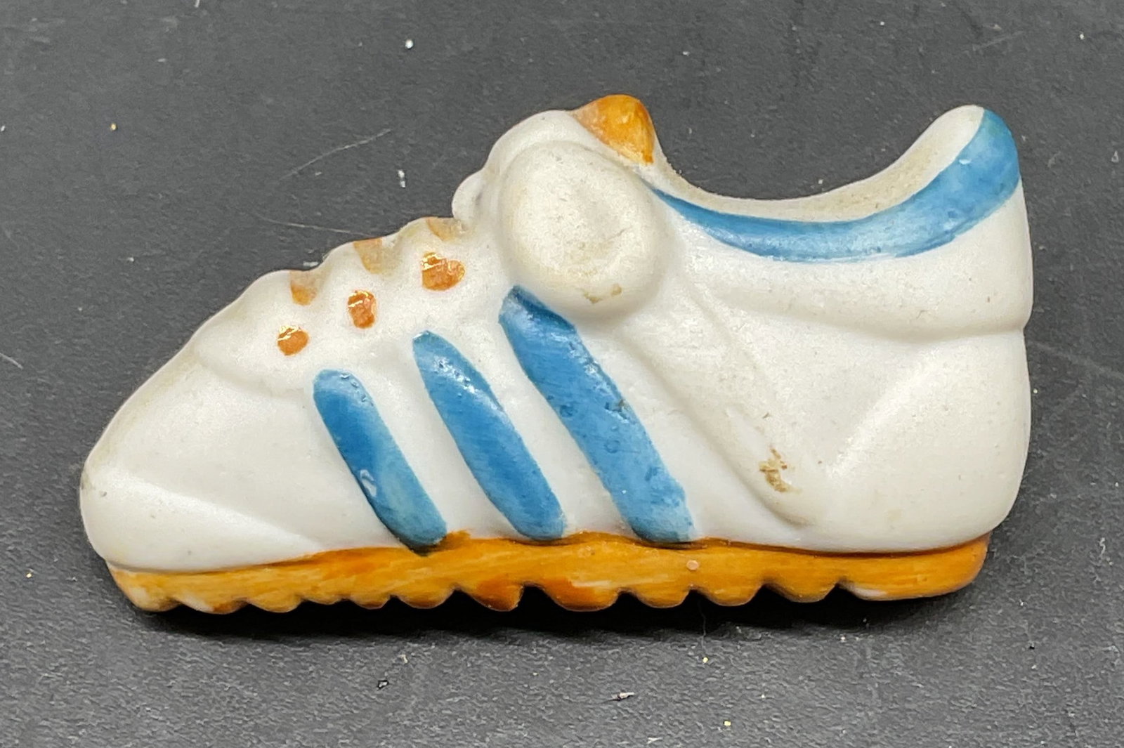 Vintage Hand Painted Ceramic Shoe Brooch: Vintage hand painted ceramic shoe brooch. Measures approx. 1.5 x .75 inches. Some scratching. Jewelry, estate jewelry, costume jewelry, cocktail jewelry, fashion jewelry, accessories, fashion accessor