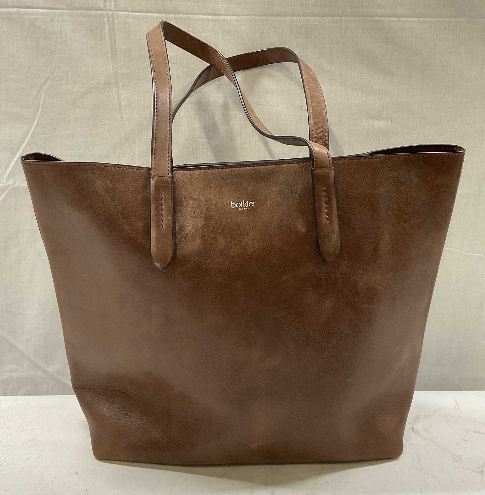 Botkier New York 100% Leather High Line Tote Bag: Botkier New York Caramel Brown Leather High Line Tote Bag. Some Scuffing and Staining. Measures app 12in H x 16in L. Botkier, New York, Brown Leather, 100% Leather, Tote Bags, Purses, Fashion