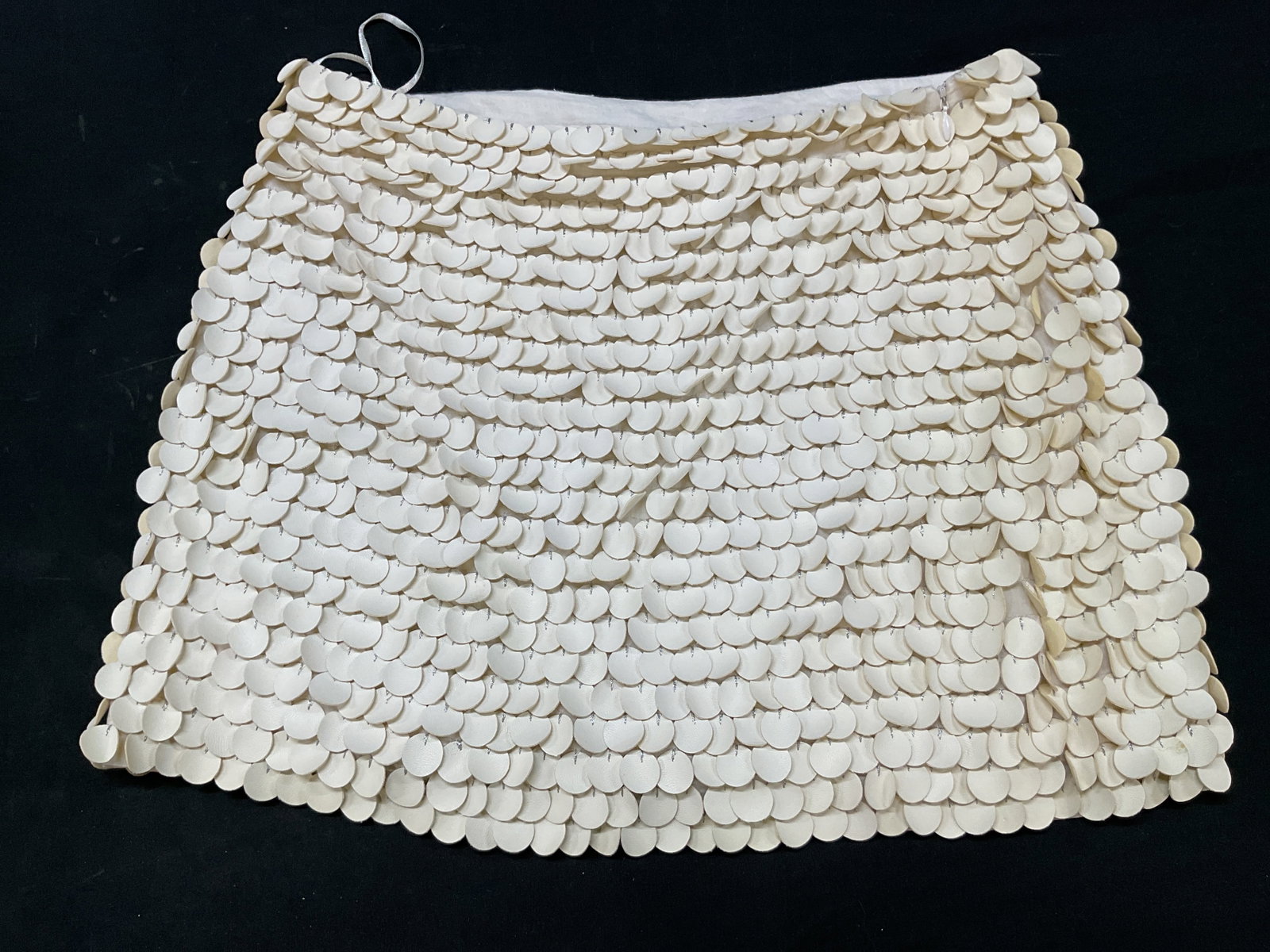 Zara Woman White Disc Fringed Skirt India NWT: New with tag. Zara Woman white disc fringed skirt. Made in India. Size S. Cotton and polyurethane. White discs connected together. Side zipper. Never worn. Skirt, bottoms, wearables, clothing,