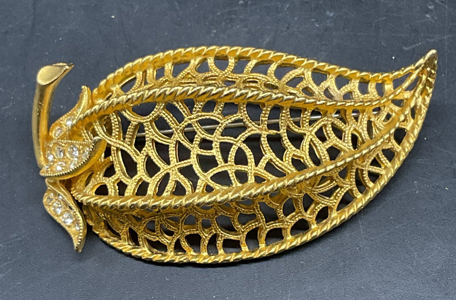 Vintage Gold Tone Crystal Pepper Brooch: Vintage gold tone and crystal pepper brooch. Measures approx. 2.5 x 1.25 inches. Some scratching. Jewelry, estate jewelry, costume jewelry, cocktail jewelry, fashion jewelry, accessories, fashion acce