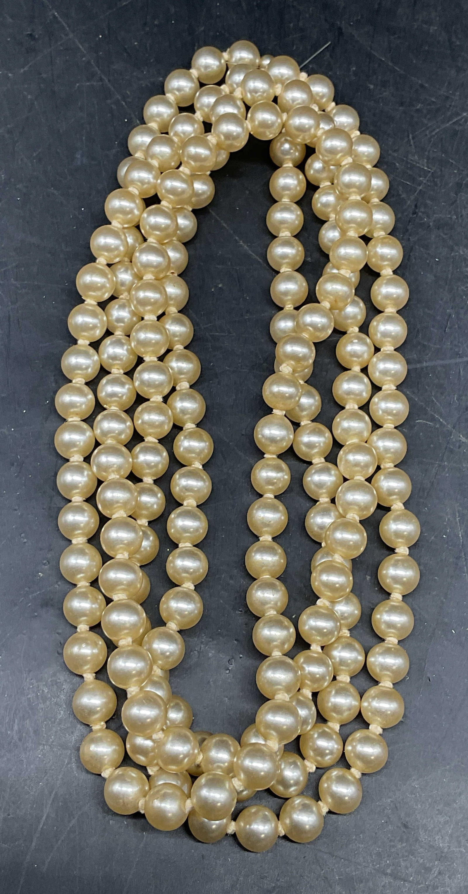 Vintage Faux Pearl Beaded Necklace, 25 In Drop: Vintage faux pearl necklace on double knotted string. Drop length 25 inches. Clasp needs replacement. Some scratching. Jewelry, estate jewelry, costume jewelry, cocktail jewelry, fashion jewelry, acce