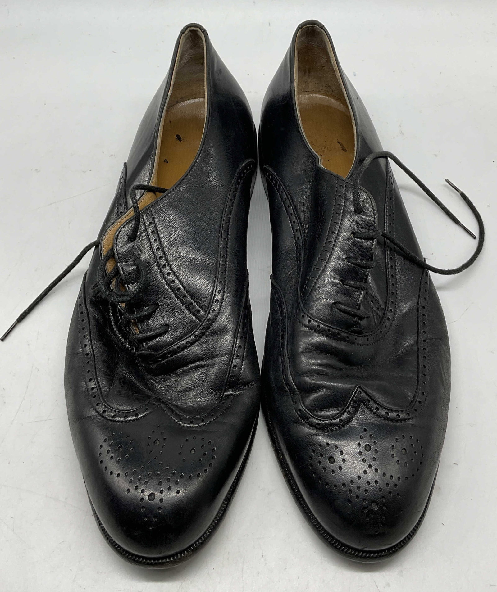 Royal Imperial Florsheim Leather Loafers Italy: Royal Imperial Florsheim black leather loafers. Made in Italy. Size 10.5. Heeled shoe. Laces. Ornate pattern. Wear consistent with exposure. Shoes, loafers, Royal Imperial Florsheim, wearables,