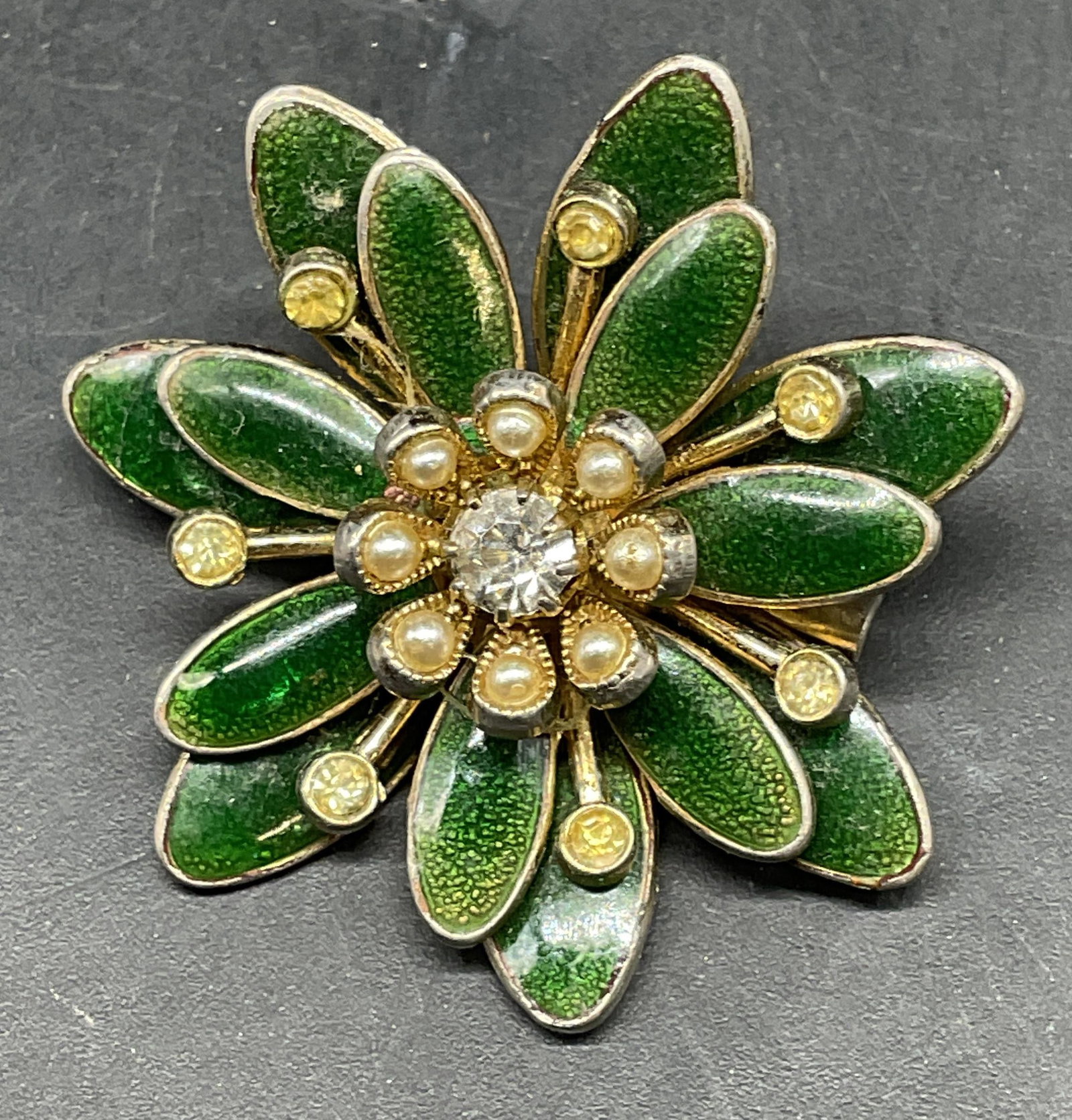 Coro Green Enamel Faux Pearl Flower Brooch: Vintage Coro gold tone green enamel, faux pearl, and crystal flower brooch. Measures approx. 1.5 inches wide. Some scratching. Jewelry, estate jewelry, costume jewelry, cocktail jewelry, fashion