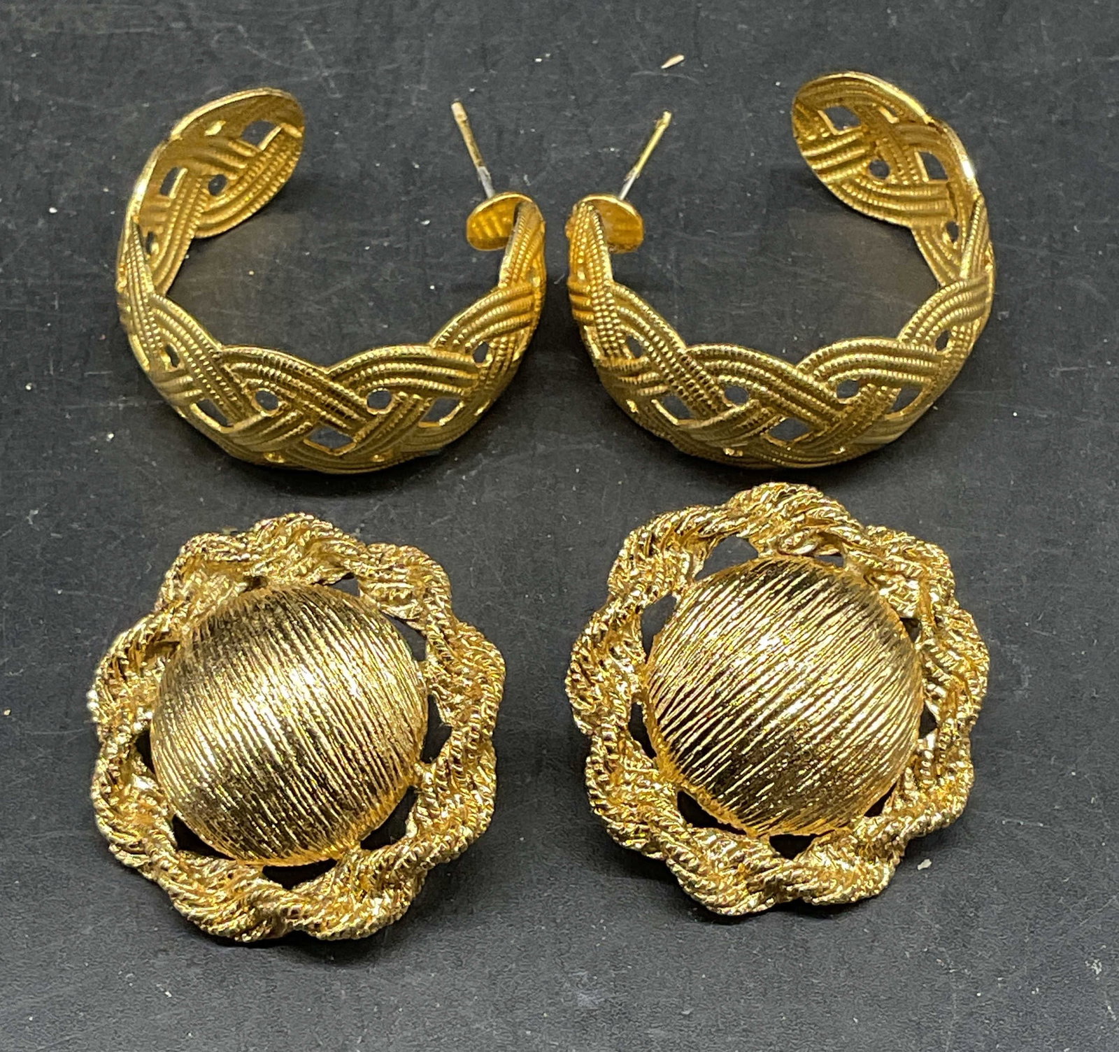 Lot 2 Monet Gold Tone Earrings, Half Hoops: Lot of 2 vintage gold tone earrings. Money round twisted candle earrings. Braised band half hoop earrings. Larger measures approx. 1 inches long. Some scratching. Jewelry, estate jewelry, costume jewe