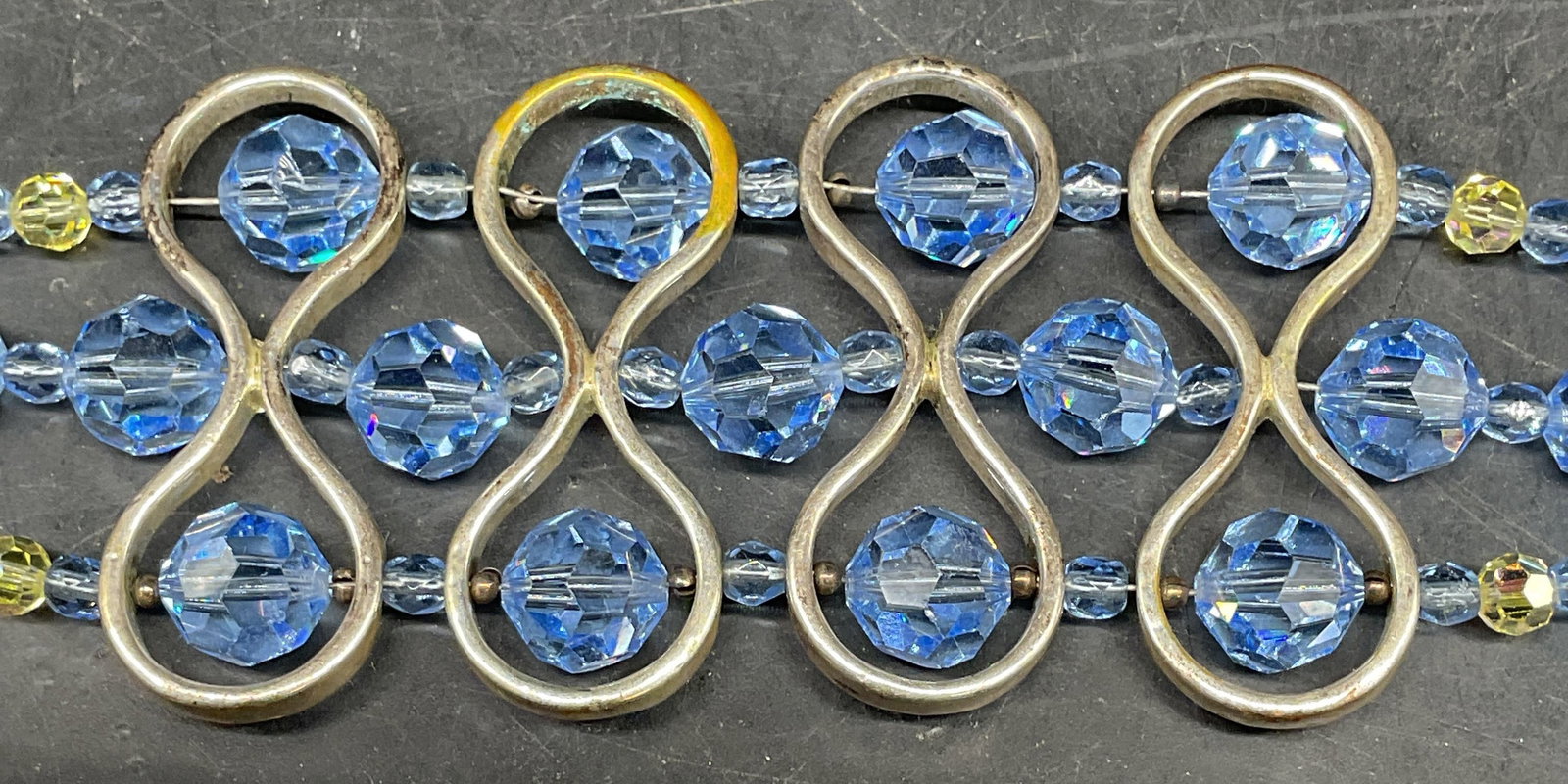 Vintage Silver Tone Blue Crystal Bracelet: Vintage silver tone and blue crystal beaded bracelet. Measures approx. 8 inches long. Some scratching. Jewelry, estate jewelry, costume jewelry, cocktail jewelry, fashion jewelry, accessories, fashion