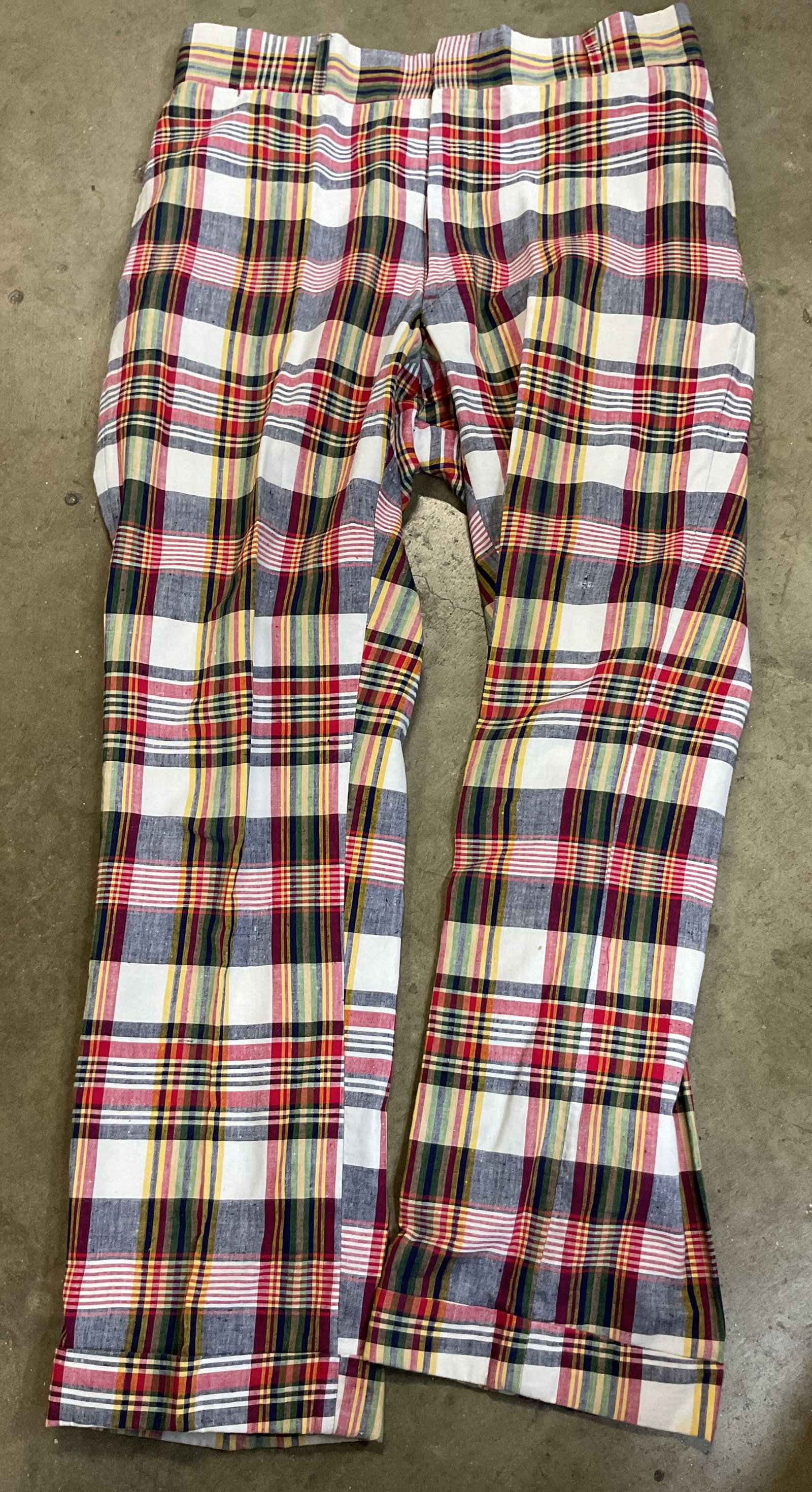 India Madras Multicolor Plaid Pants: India Madras multicolor plaid pants. Cotton. Measures approx 17 inches across waist. Plaid pattern in blue, red, white, and more. Pockets. Wear consistent with exposure, holes, ripping. Pants,