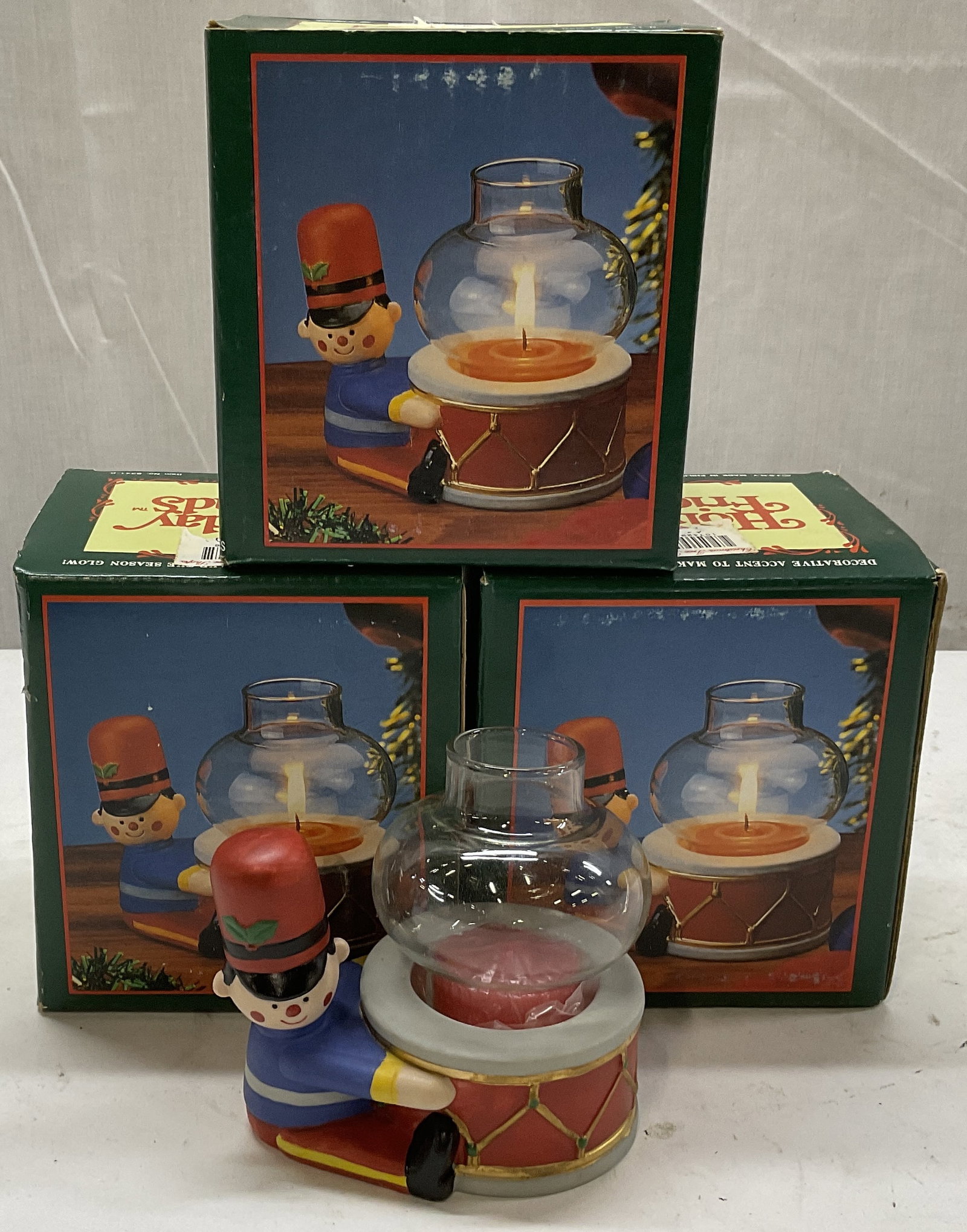 Lt4 JSNY Holiday Friends Candle Holders PHLP: 4 Vintage J.S.N.Y. Holiday Friends Bisque Porcelain Nutcracker Candle Holders. Made in Philippines. Comes with Original Boxes. Only One Examined Out of Packaging. Some Chipping in Glass Domes.