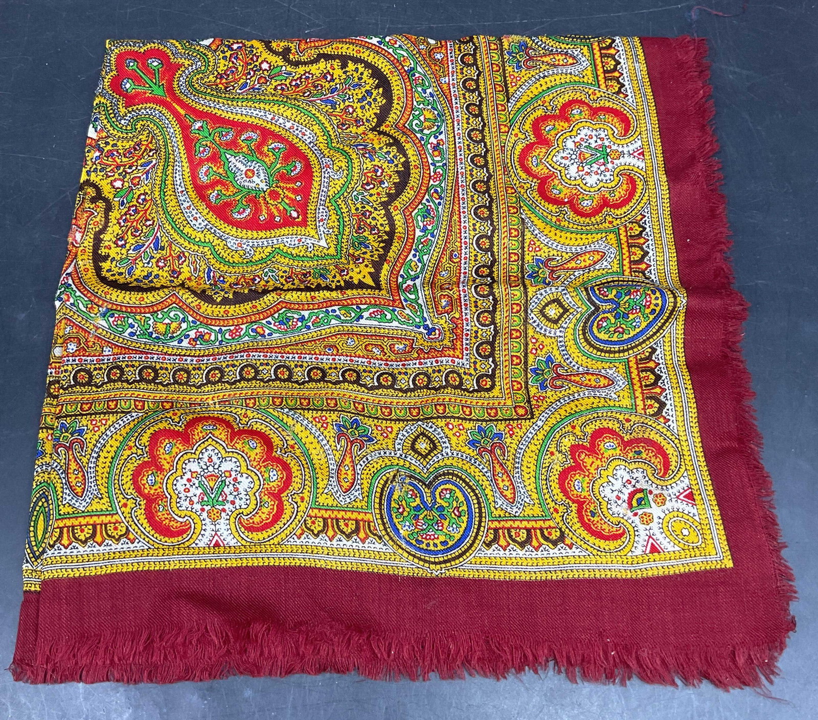 Vintage Red & Yellow Paisley Print Scarf: Vintage red and yellow paisley print scarf with fringe edge. Feels life wool. Measures approx. 25 x 24 inches. Some wear consistent with exposure. Scarf, vintage scarf, accessories, fashion