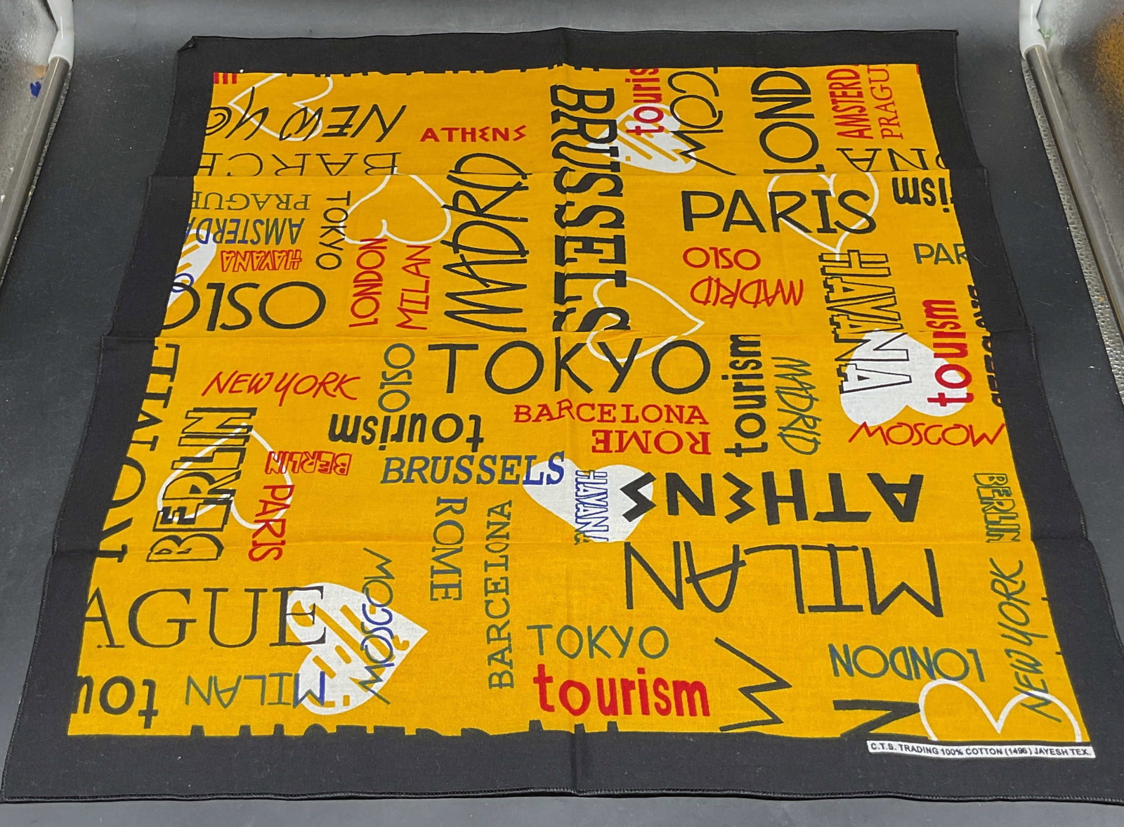 CTS Trading Yellow Cotton Travel Print Bandana: CTS Trading yellow and black travel motif print cotton bandana. Measures approx. 19.5 x 19.5 inches. Some wear consistent with exposure. Bandana, yellow bandana, travel bandana, accessories, fashion a