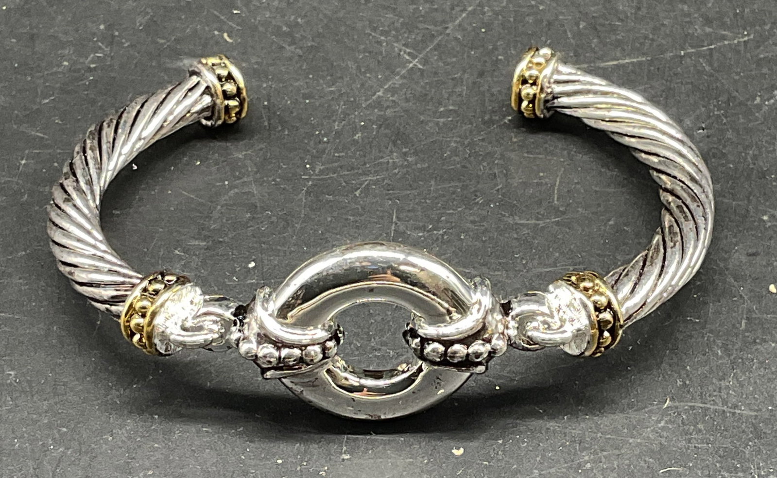 Napier Silver & Gold Tone Cable Cuff Bracelet: Vintage Napier silver and gold tone twisted candle band cuff bracelet. Measures approx. 2.5 inches wide. Some scratching. Jewelry, estate jewelry, costume jewelry, cocktail jewelry, fashion jewelry,