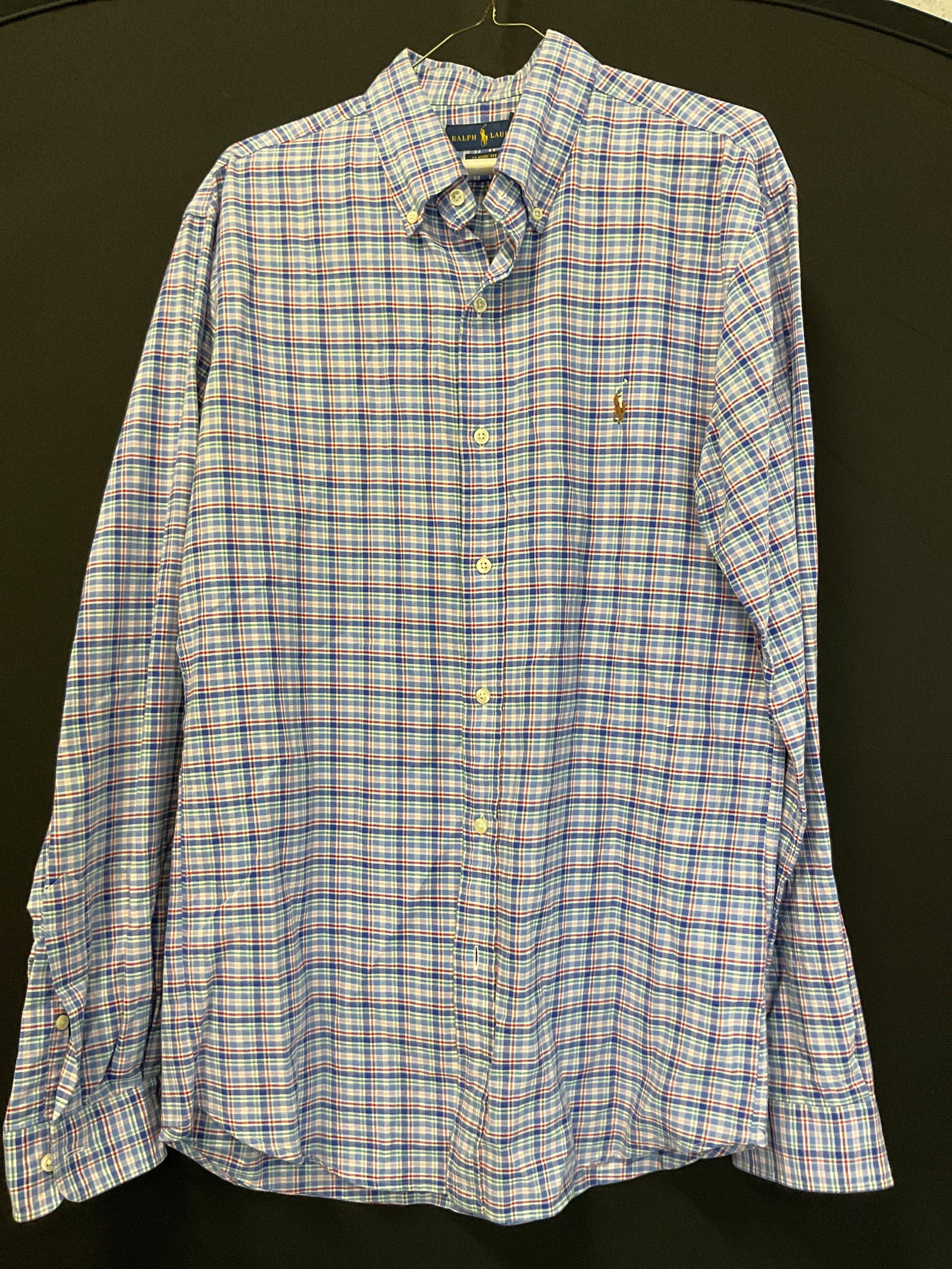 Ralph Lauren Plaid Button Down: Ralph Lauren plaid button down. Size LG. Classic fit. Cotton. Long sleeve. Collared and buttoned. Embroidered logo. Plaid pattern in blue, white, red, green, and more. Wear consistent with exposure. B
