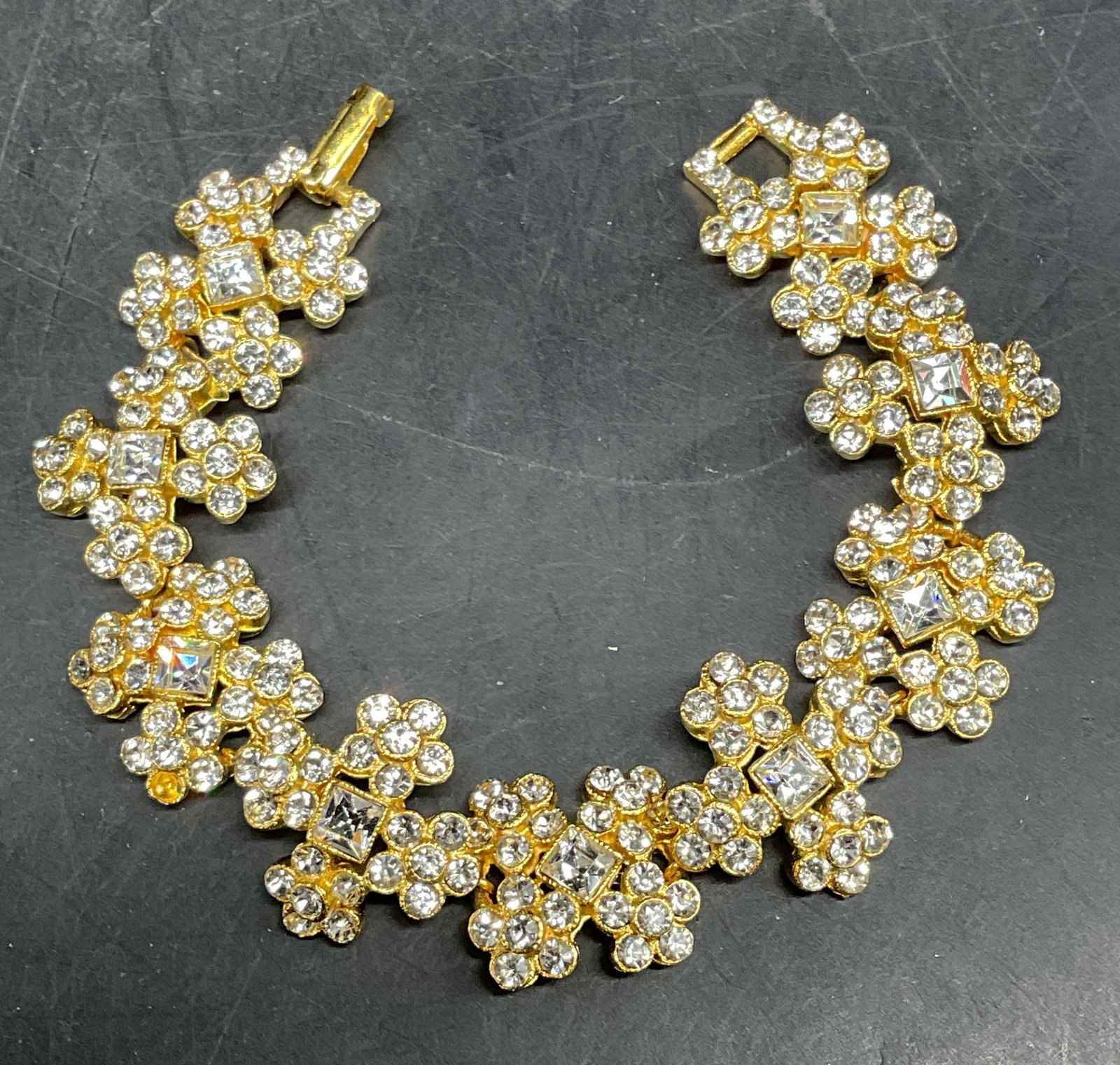 Vintage Gold Tone Crystal Cross Link Bracelet: Vintage gold tone colorless crystal cross link bracelet. Measures approx. 6.5 inches long. Some scratching. Jewelry, estate jewelry, costume jewelry, cocktail, jewelry, fashion jewelry, accessories,