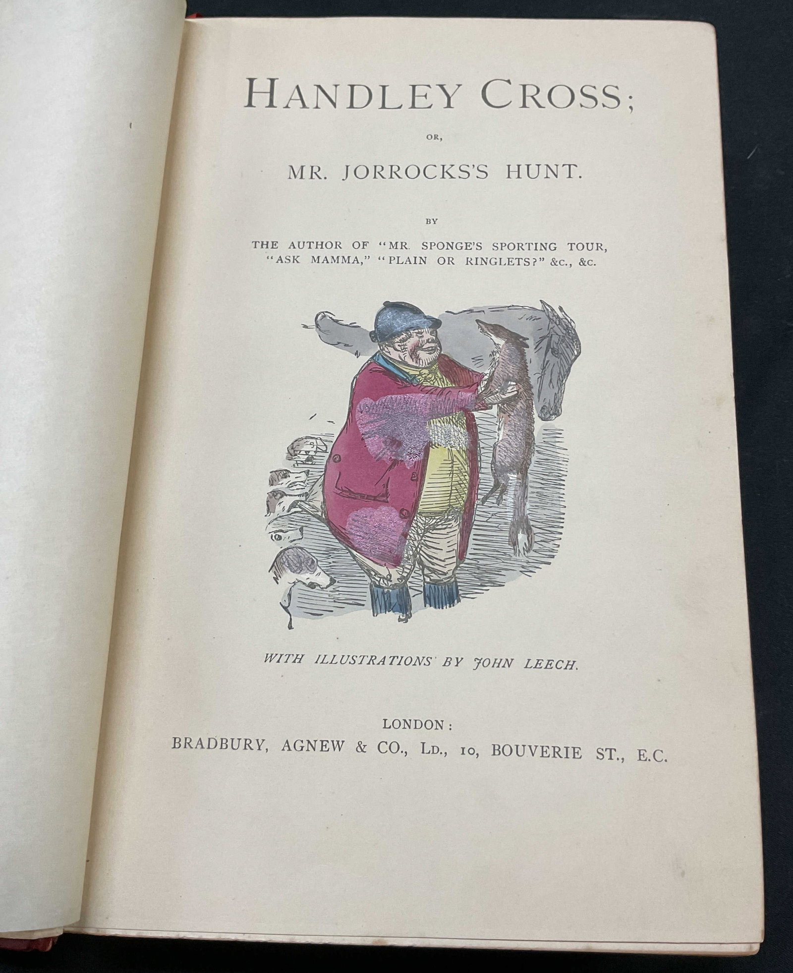 1851 Handley Cross Illustrated Book Surtees+: Handley Cross Or Mr Jorrocks Hunt. By Robert Smith Surtees. Published by Bradbury, Agnew & Co, 1851. Illustrations by John Leech. Hard cover red leather bound with embossed gilt trim. Measures approx